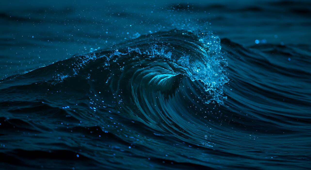 1283x700 Deep Blue Ocean Wave with Water Droplets in Motion for Marine Nature or Water Sports Background