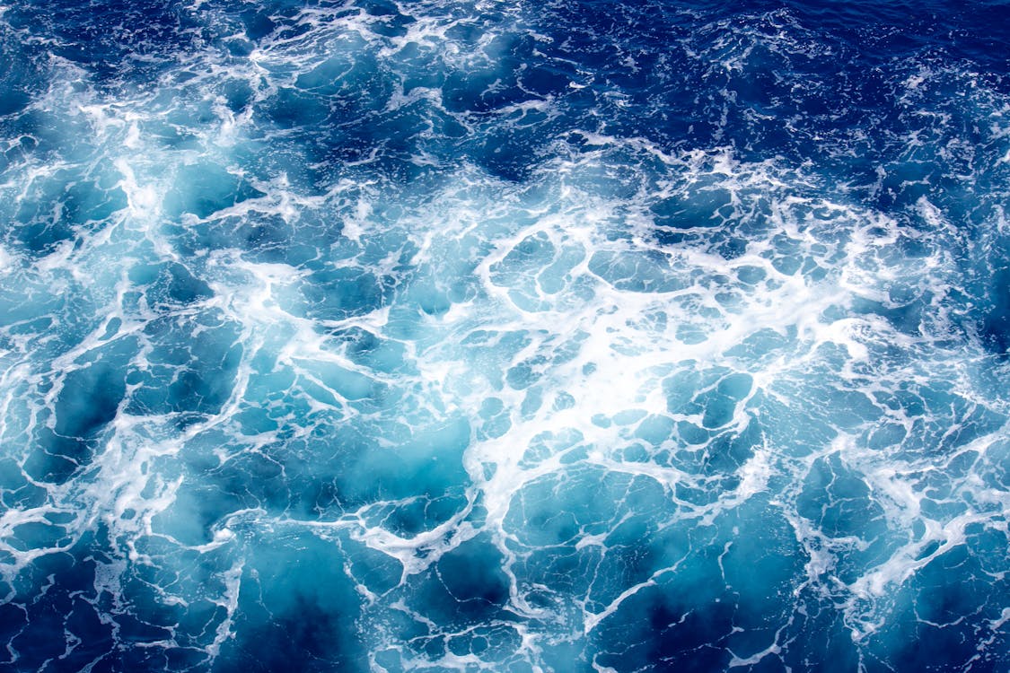 1125x750 Close Up Of Blue, Foamy Water · Free