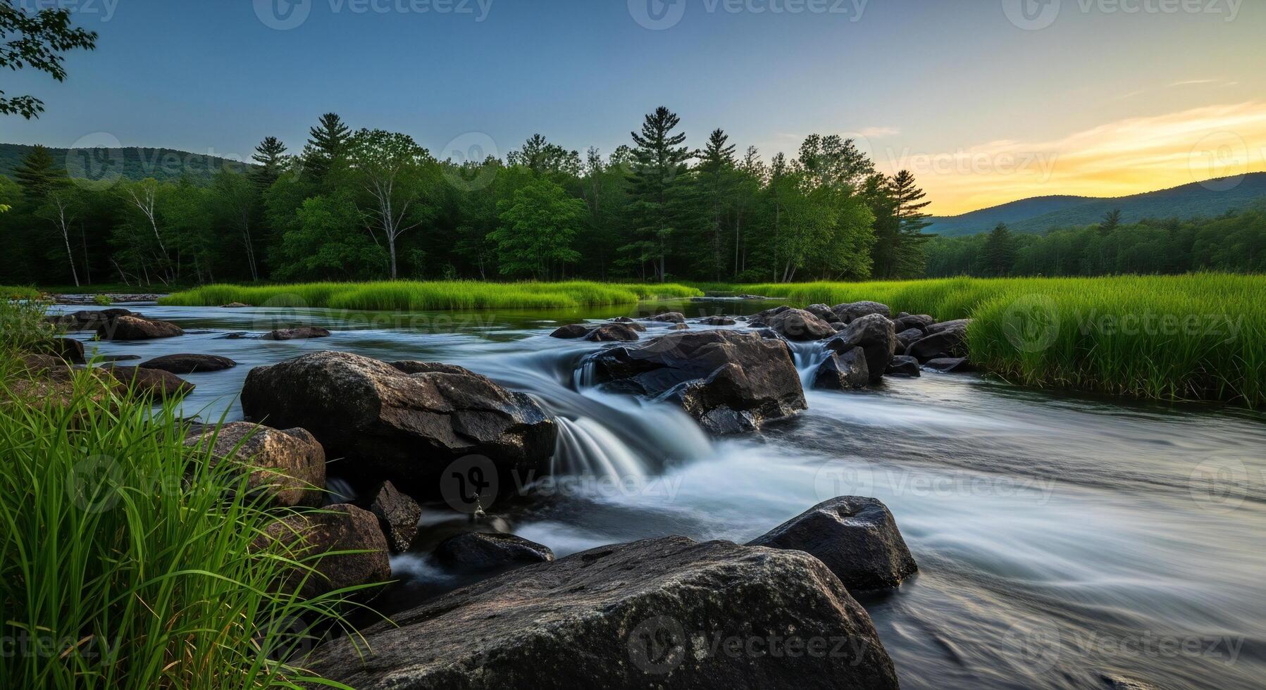 1797x980 Nature background, Nature wallpaper, Lush green riverside with flowing water over rocks and distant tree covered hills at sunset