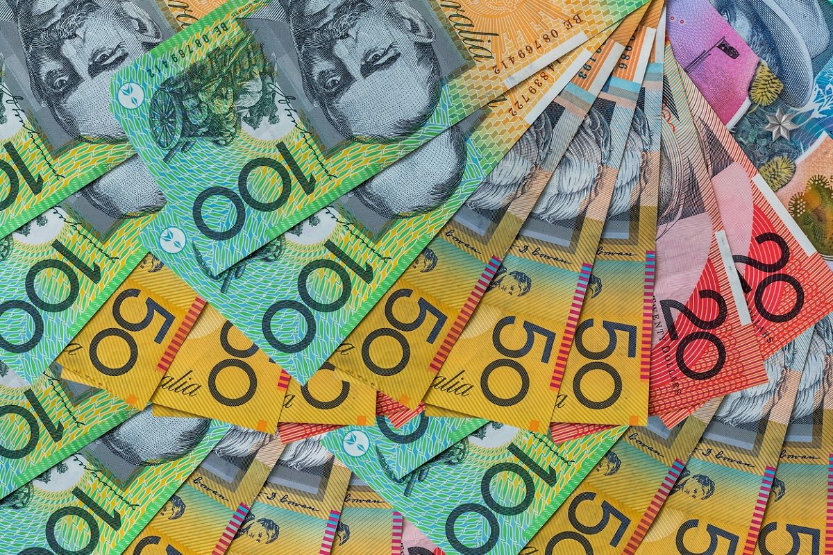 1200x800 Colorful australian dollars laying on wooden table & Impulse Retailing