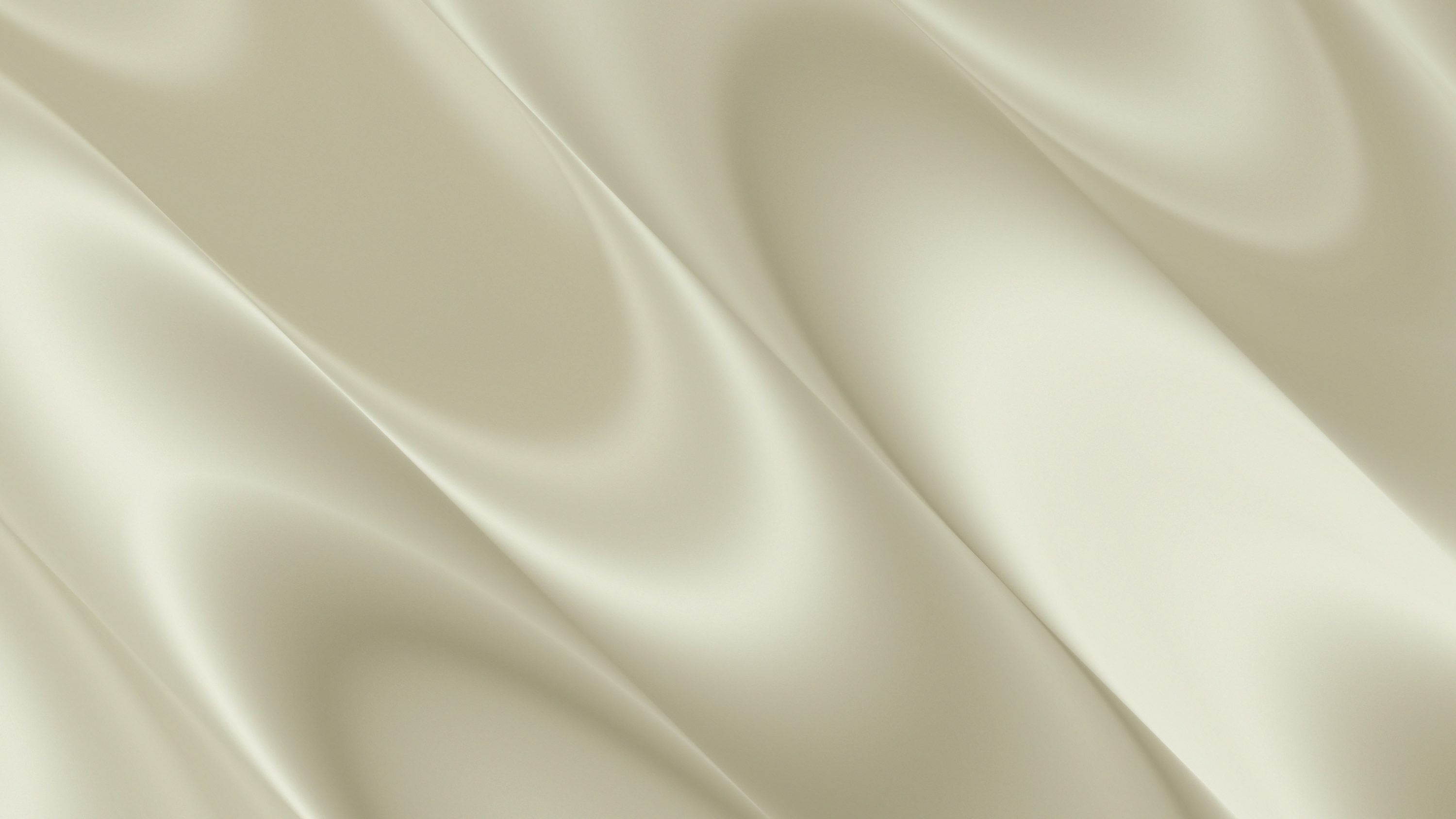 3000x1688 Soft, flowing, light beige fabric with elegant folds photo