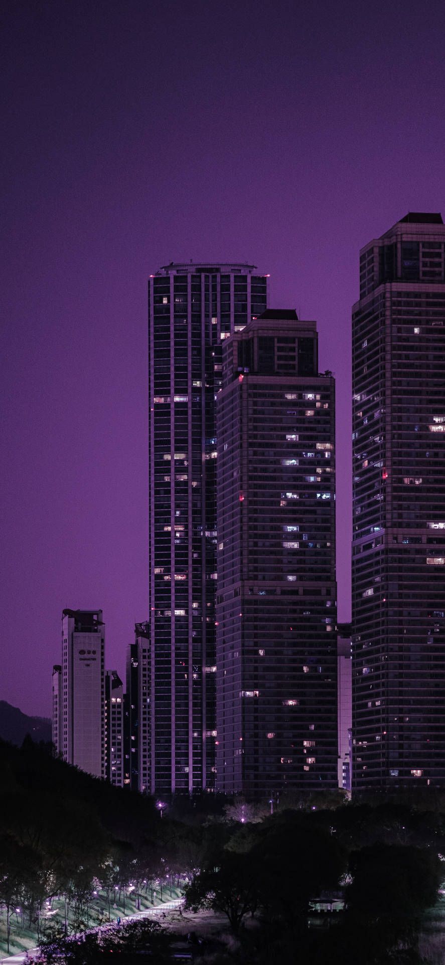 887x1920 Download Skyscrapers With Dark Purple Sky Wallpaper