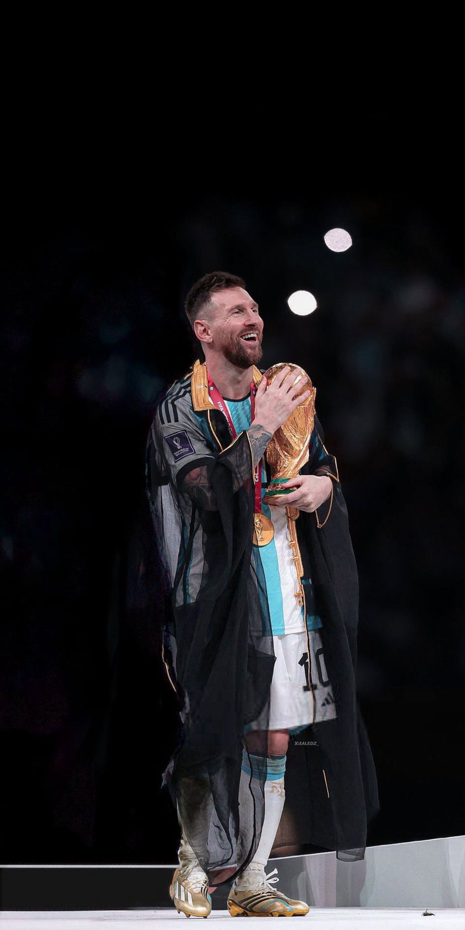 946x1892 Lionel Messi Lifts 2022 World Cup Trophy Football Wallpaper