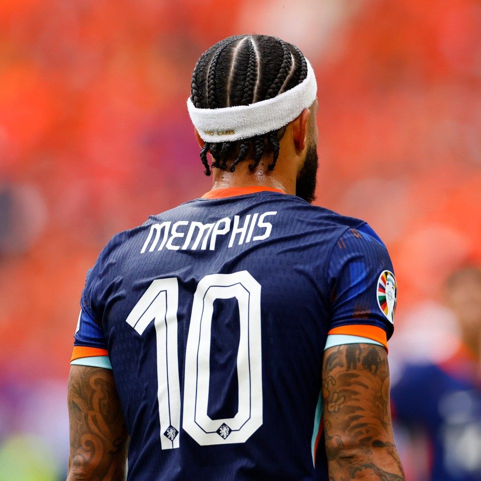 960x960 Why does former Man Utd striker Memphis Depay wear a headband and what is written on the Dutch footballer's headgear?