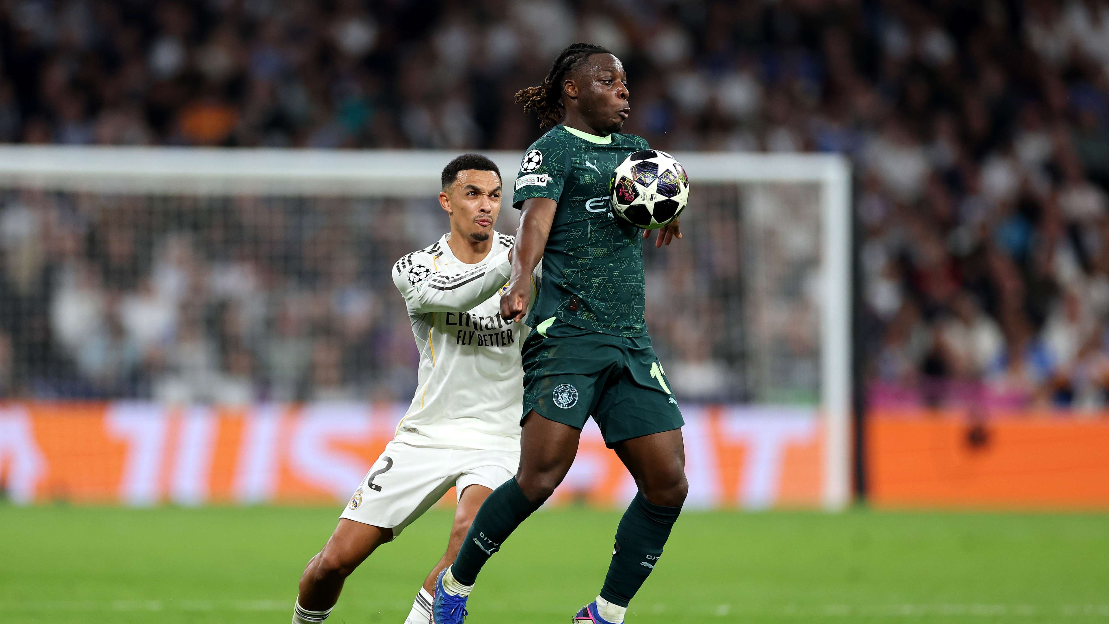 3840x2160 VIDEO: Jeremy Doku vanishes for split second as live TV viewers left completely baffled during Man City's Champions League clash with Real Madrid. Goal.com English Qatar