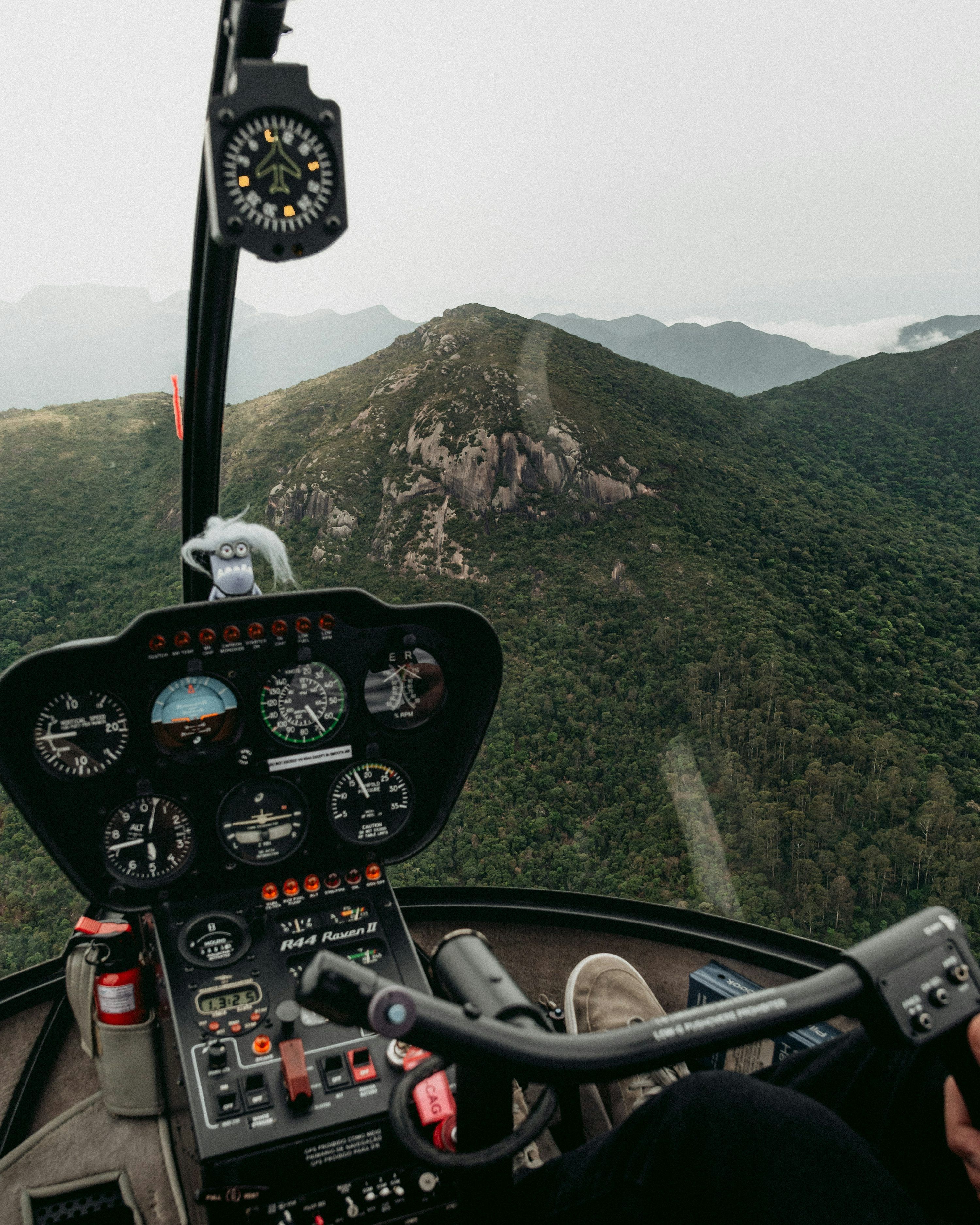 3000x3750 A view from inside a helicopter of a mountain range photo