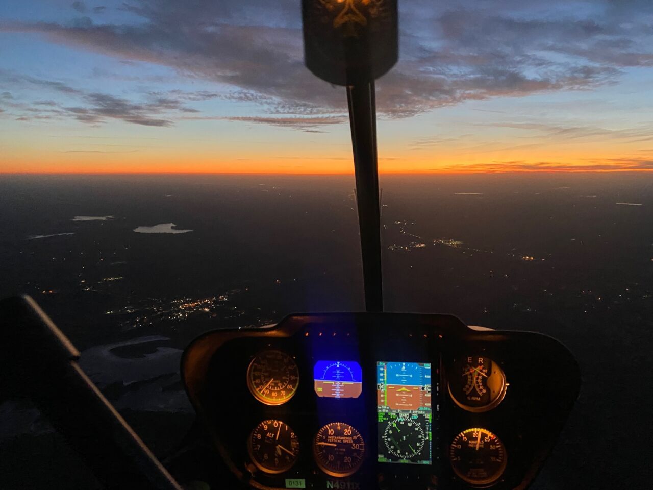 1280x960 Conversation about flying helicopters from Duluth group, as aerial flights of Rotary Lights begins Thursday 92.3FM 106.7FM 1410AM