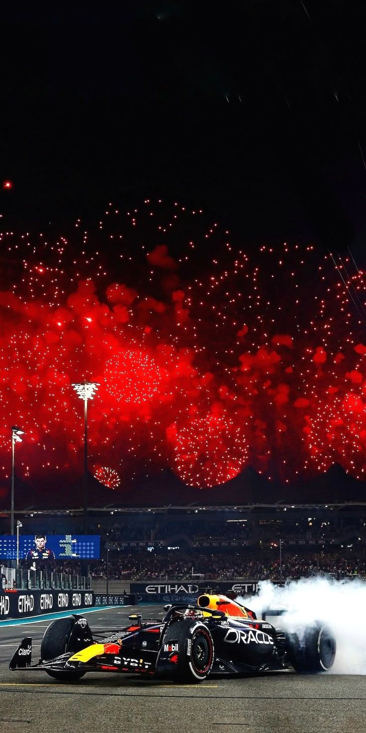 736x1472 Red and Yellow Race Car on Track with Fireworks. Formula 1 red bull, F1 fireworks