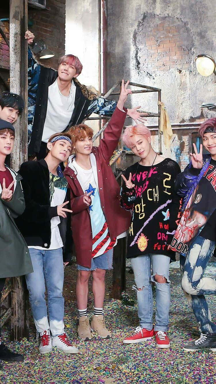 750x1333 Download BTS Photohoot Doing Peace Signs Wallpaper
