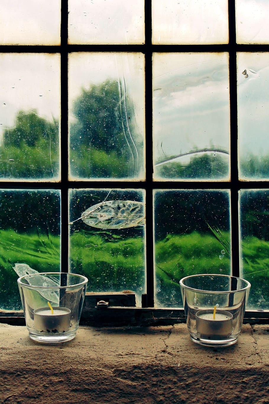 910x1365 HD wallpaper: two clear glass candle holders, window, candles