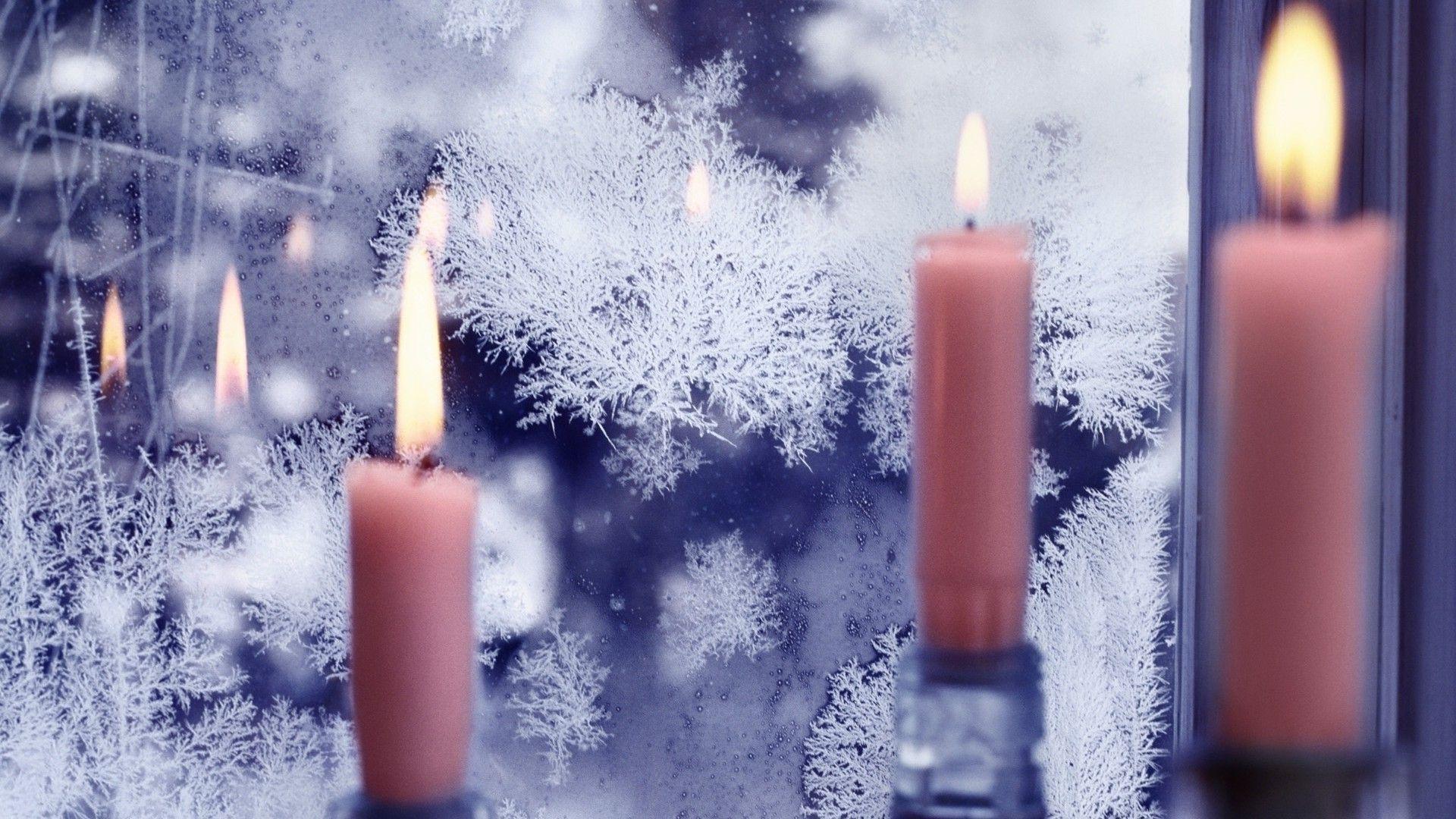 1920x1080 Candles at a frozen window