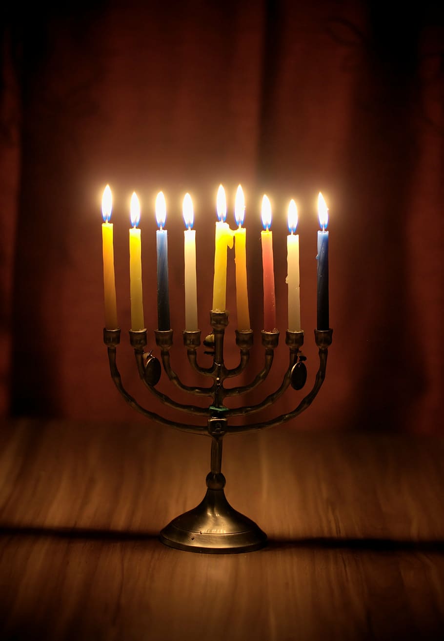 910x1314 HD wallpaper: lighted taper candles on candlelabra, hanukkah