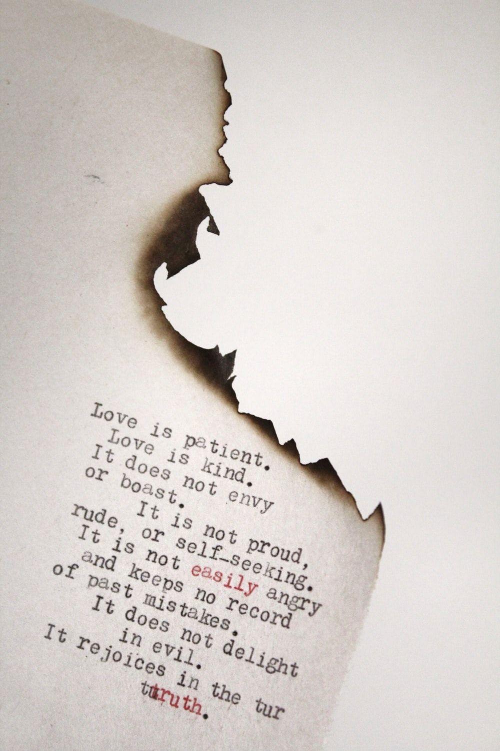 1000x1500 Love is patient Love is kind printed on burned paper photo