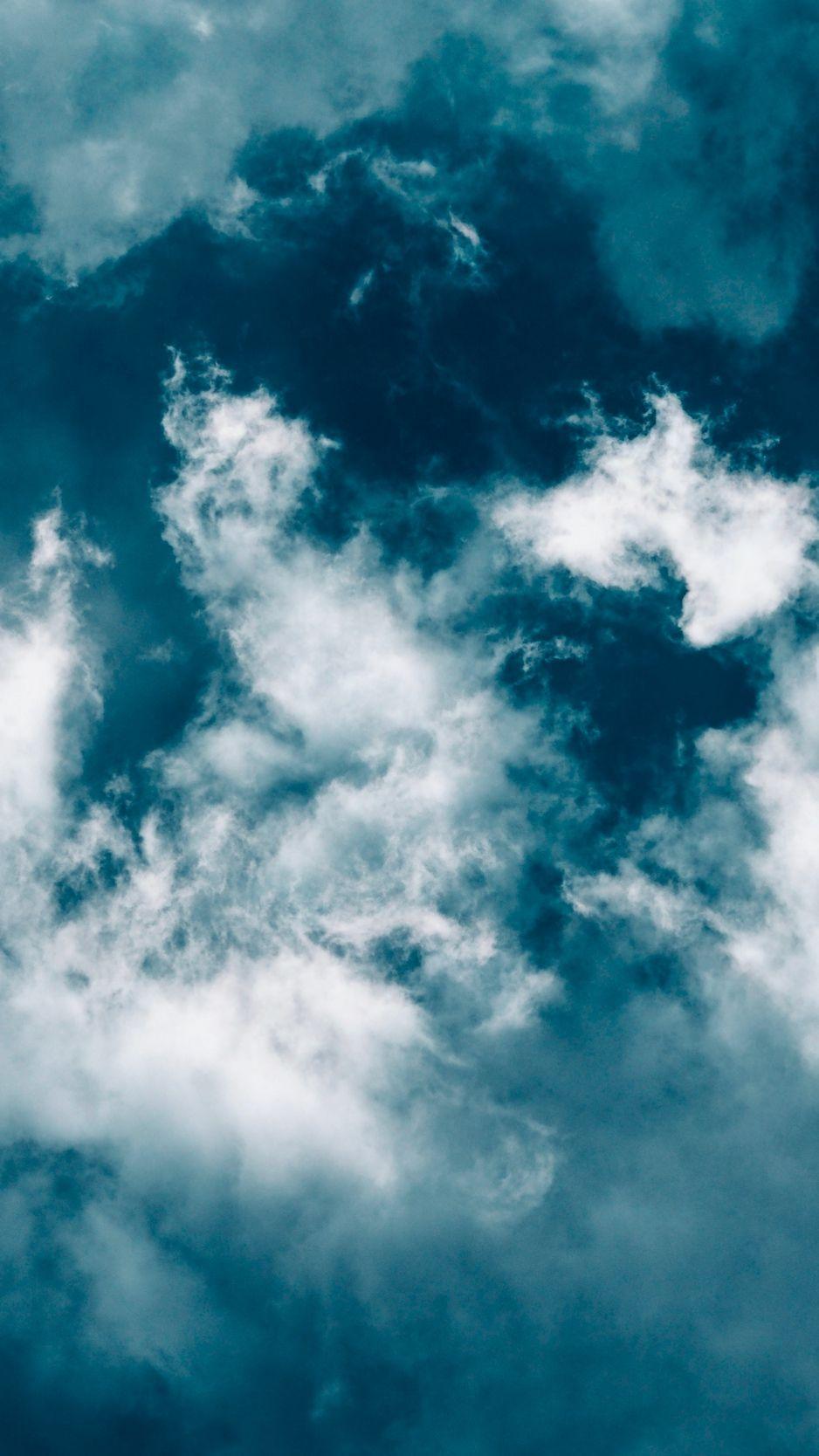 938x1668 Download wallpaper 938x1668 clouds, sky, porous, blue, white