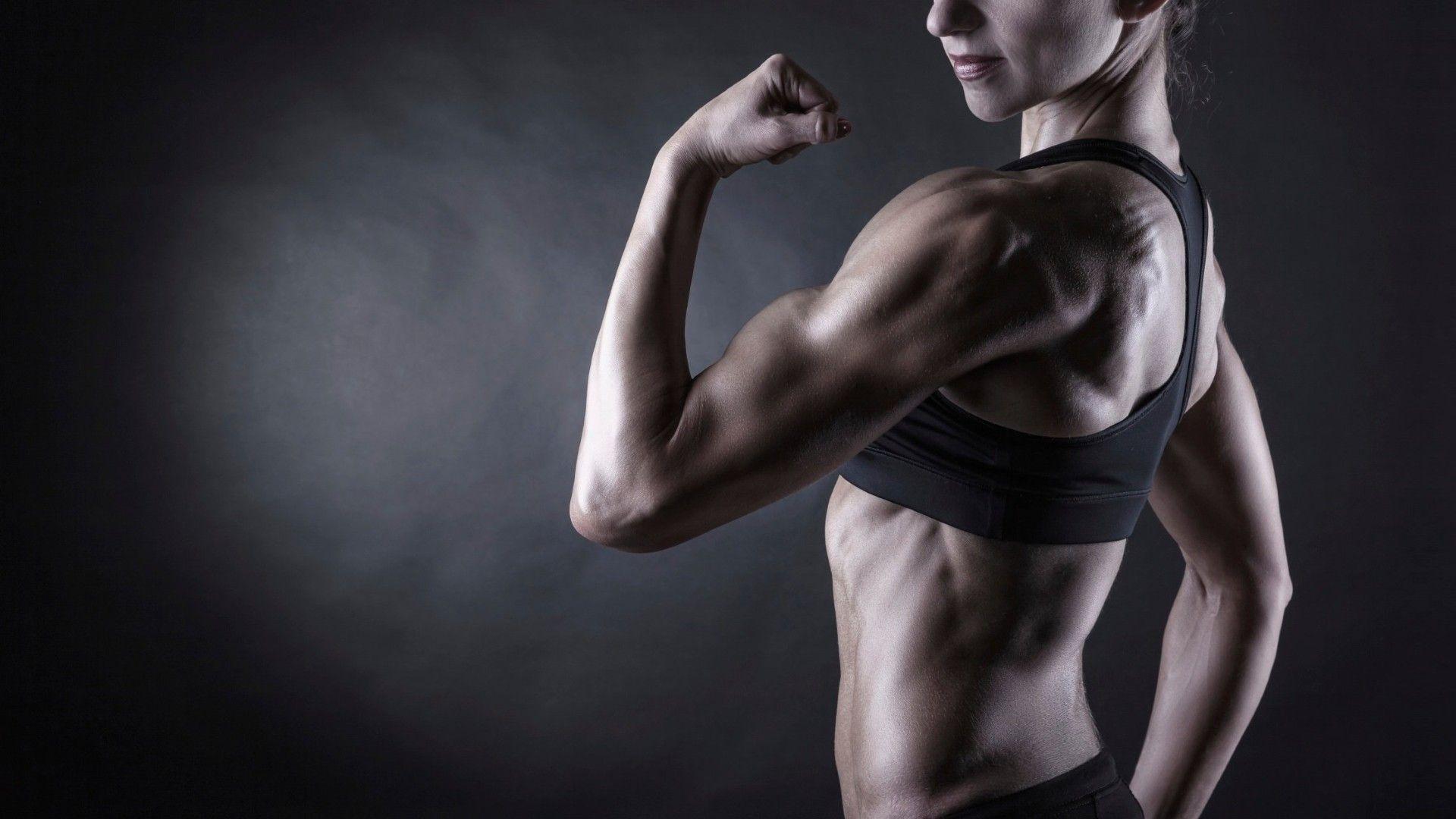 1920x1080 Strong woman showing off biceps, bodybuilding wallpaper