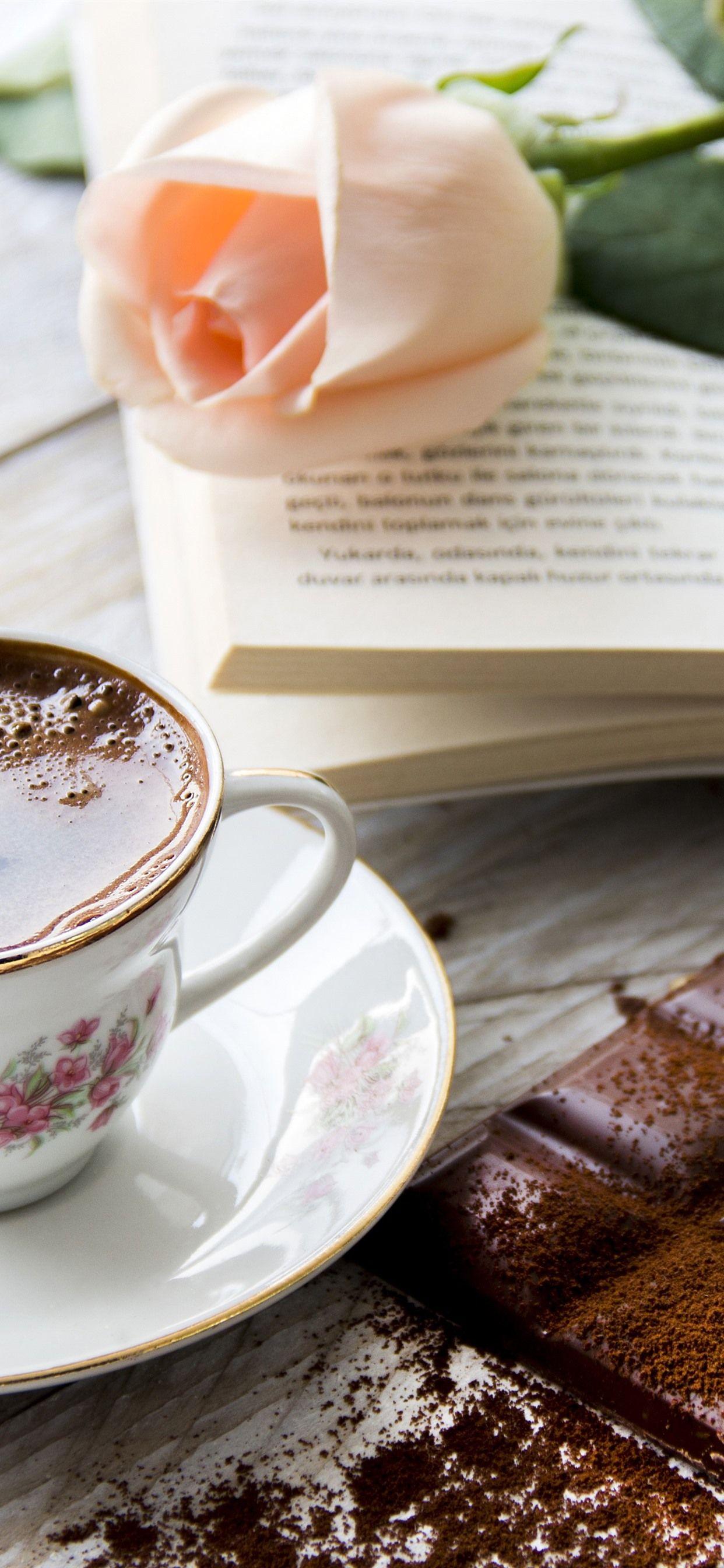 1242x2688 One cup of tea, chocolate, pink rose, book 1242x2688 iPhone 11 Pro