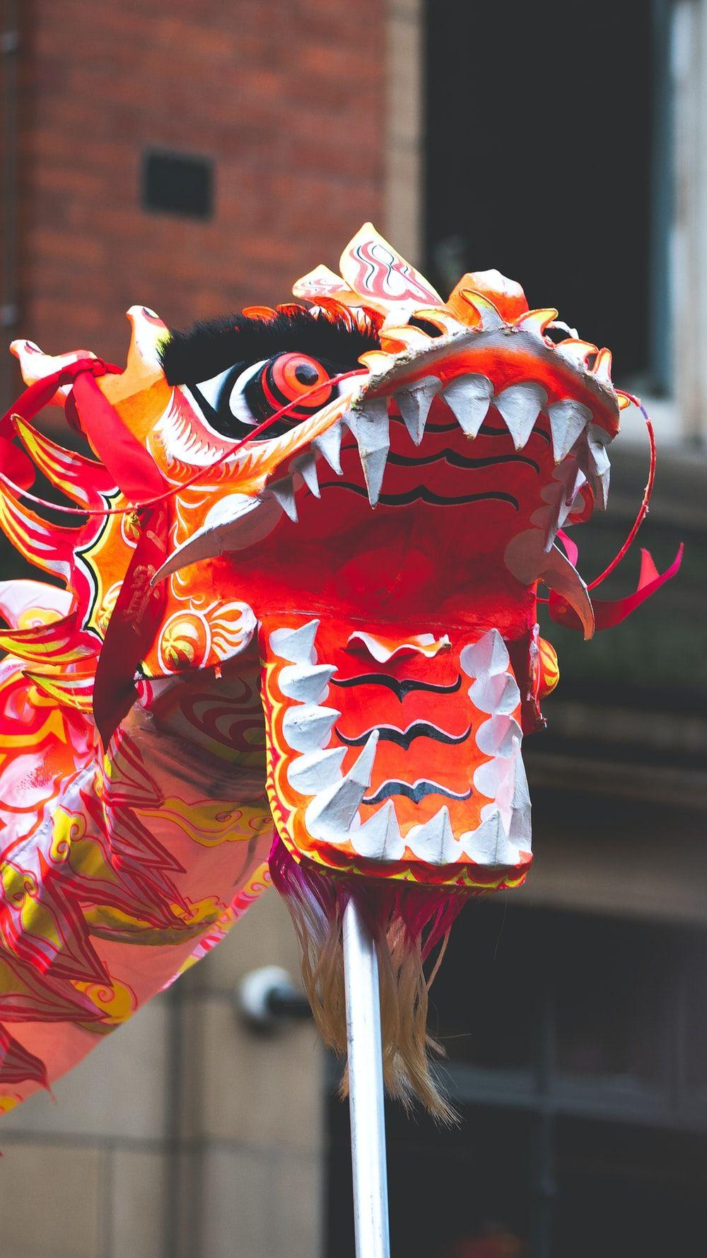 1000x1778 red and white dragon dance photo