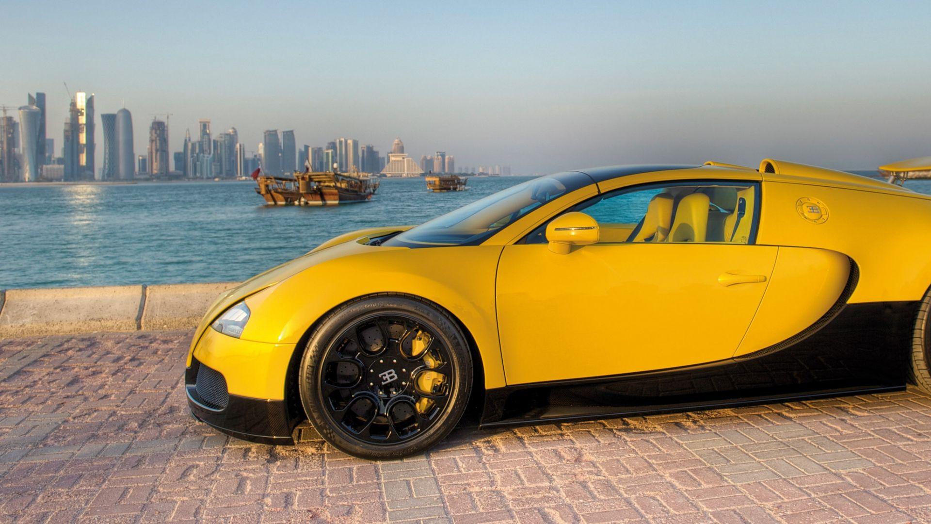 1920x1080 Yellow Aerofoil Car Wallpaper