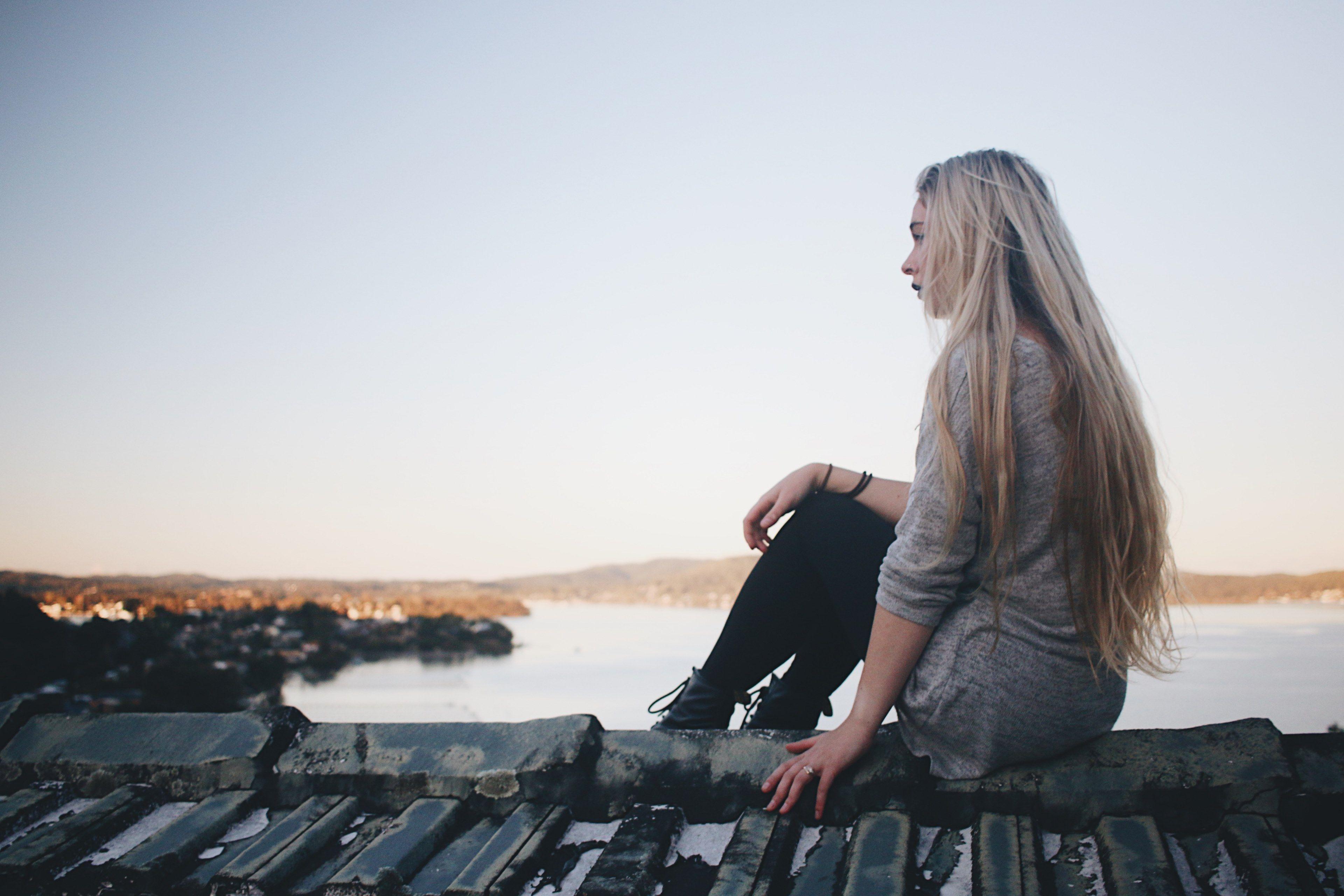 3840x2560 woman siting alone on a pier and thinking near the lakewhoops 4k