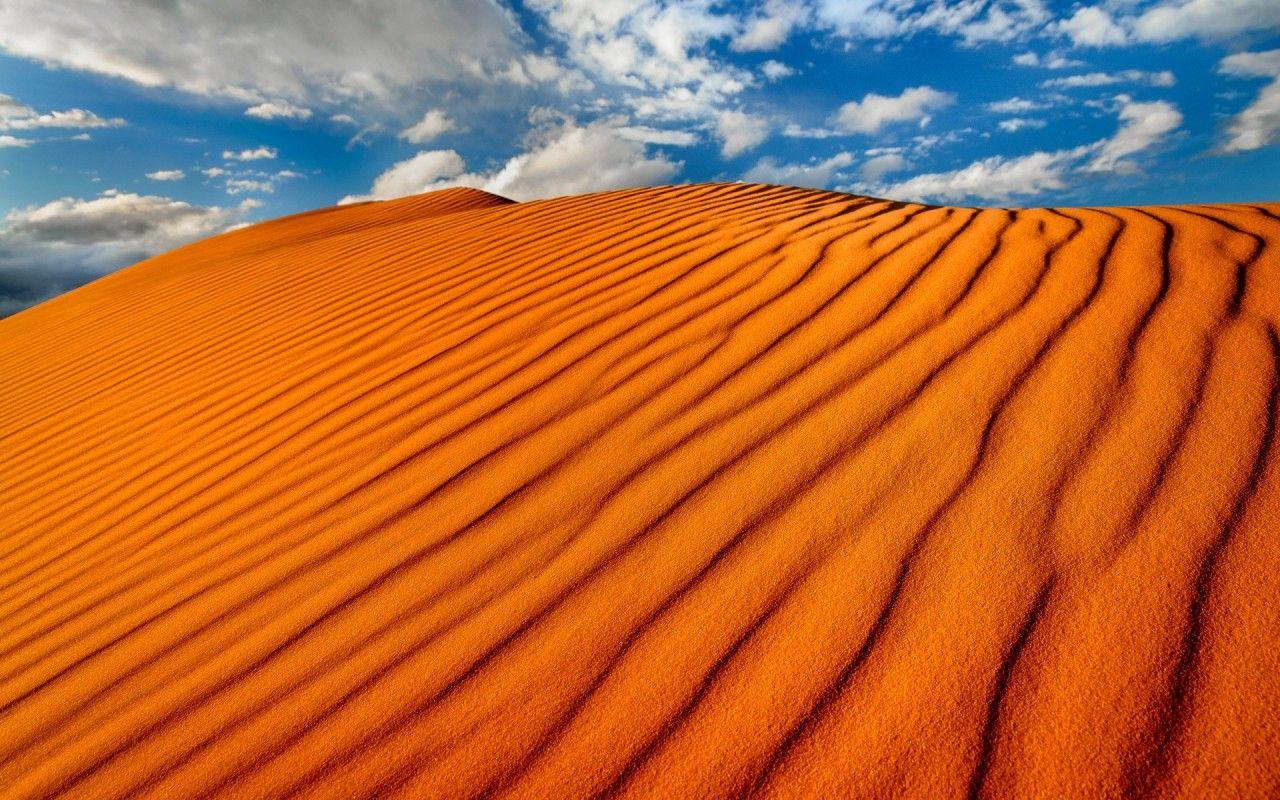 1280x800 Vibrant Orange Sand Dunes wallpaper. Vibrant Orange Sand Dunes