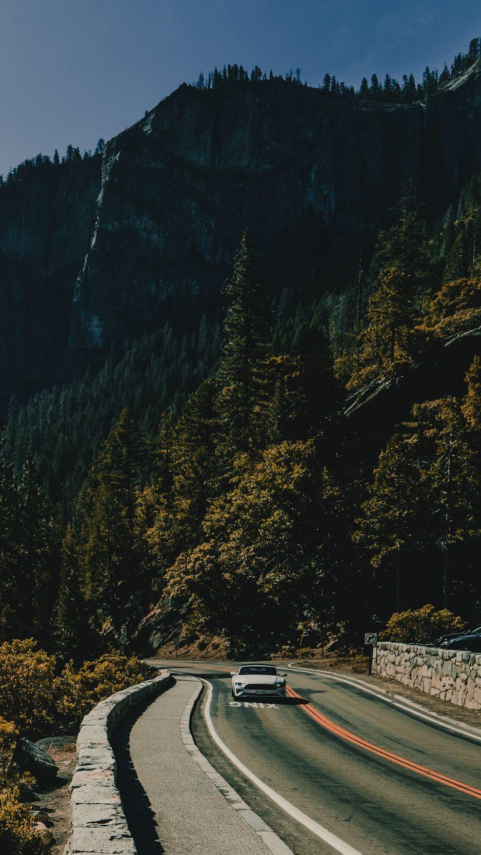 938x1668 Download wallpaper 938x1668 mountains, road, car, movement iphone