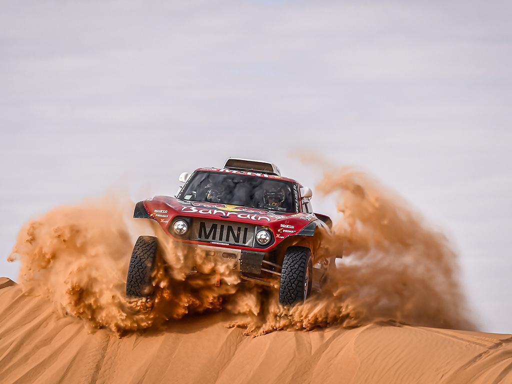 1024x768 Free download Carlos Sainz and Mini win 2020 Dakar Rally