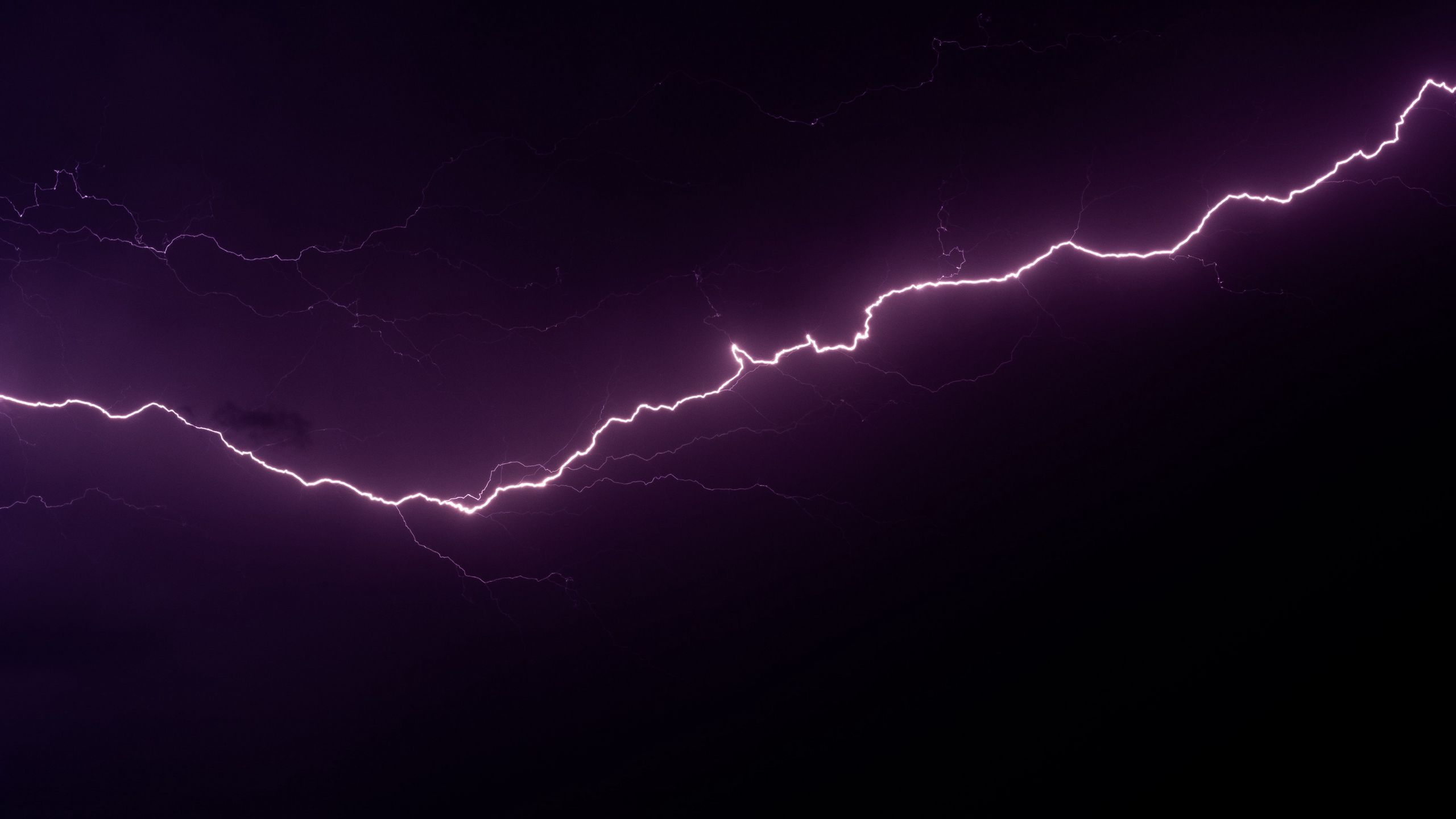 2560x1440 Download wallpaper 2560x1440 lightning, glow, night, dark widescreen 16:9 HD background