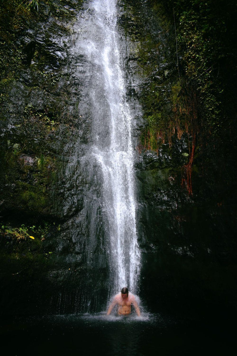 1000x1500 waterfalls near wooden bridge and trees wallpaper photo