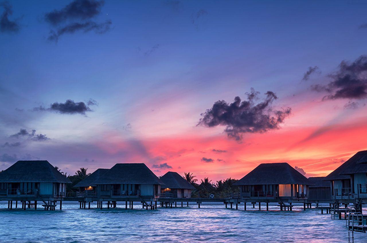 1280x850 Picture Maldives Bungalow Nature Tropics sunrise and sunset Clouds