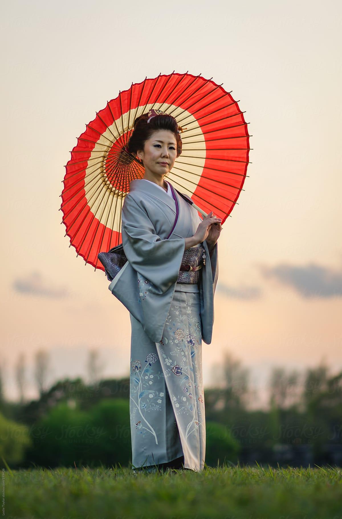 1200x1820 Japanese Woman Wearing Kimono and Holding Traditional Umbrella