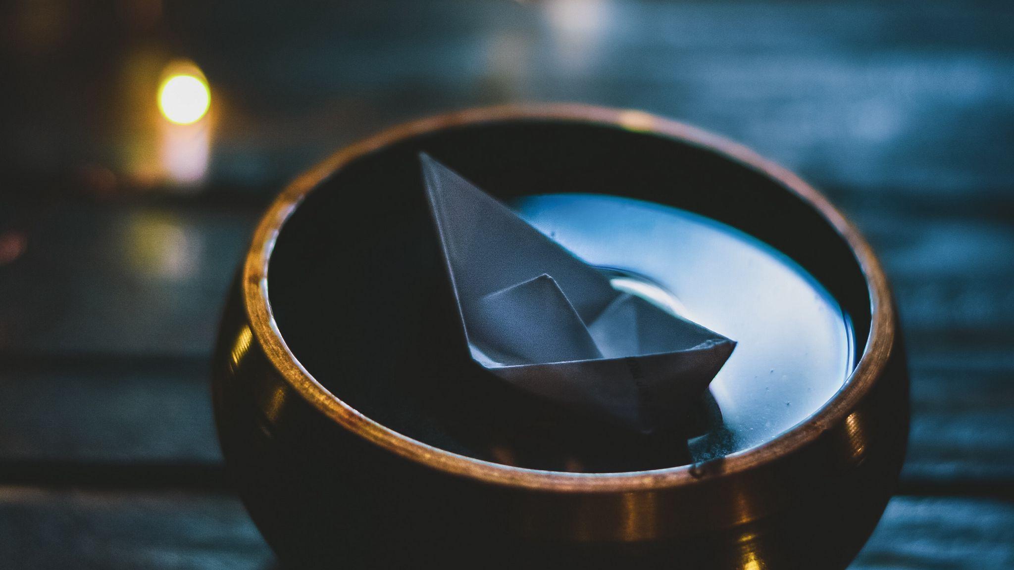 2048x1152 Download wallpaper 2048x1152 origami, boat, bowl, water ultrawide
