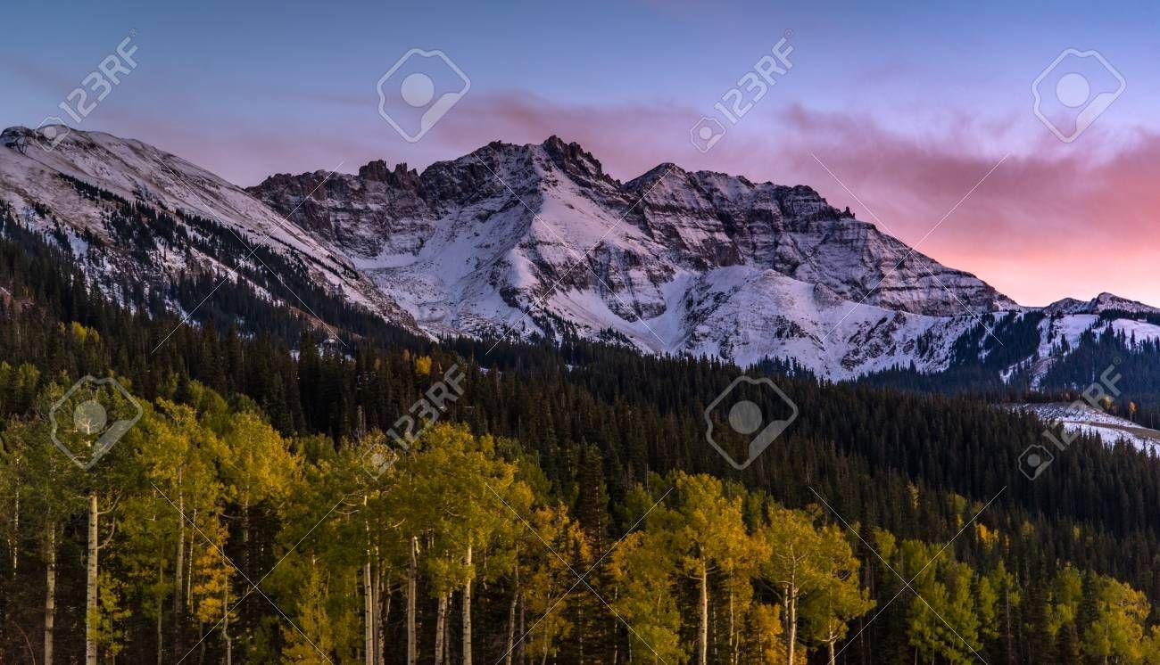 1300x746 Free download Sunset Over Autumn Forest With Mountain Background