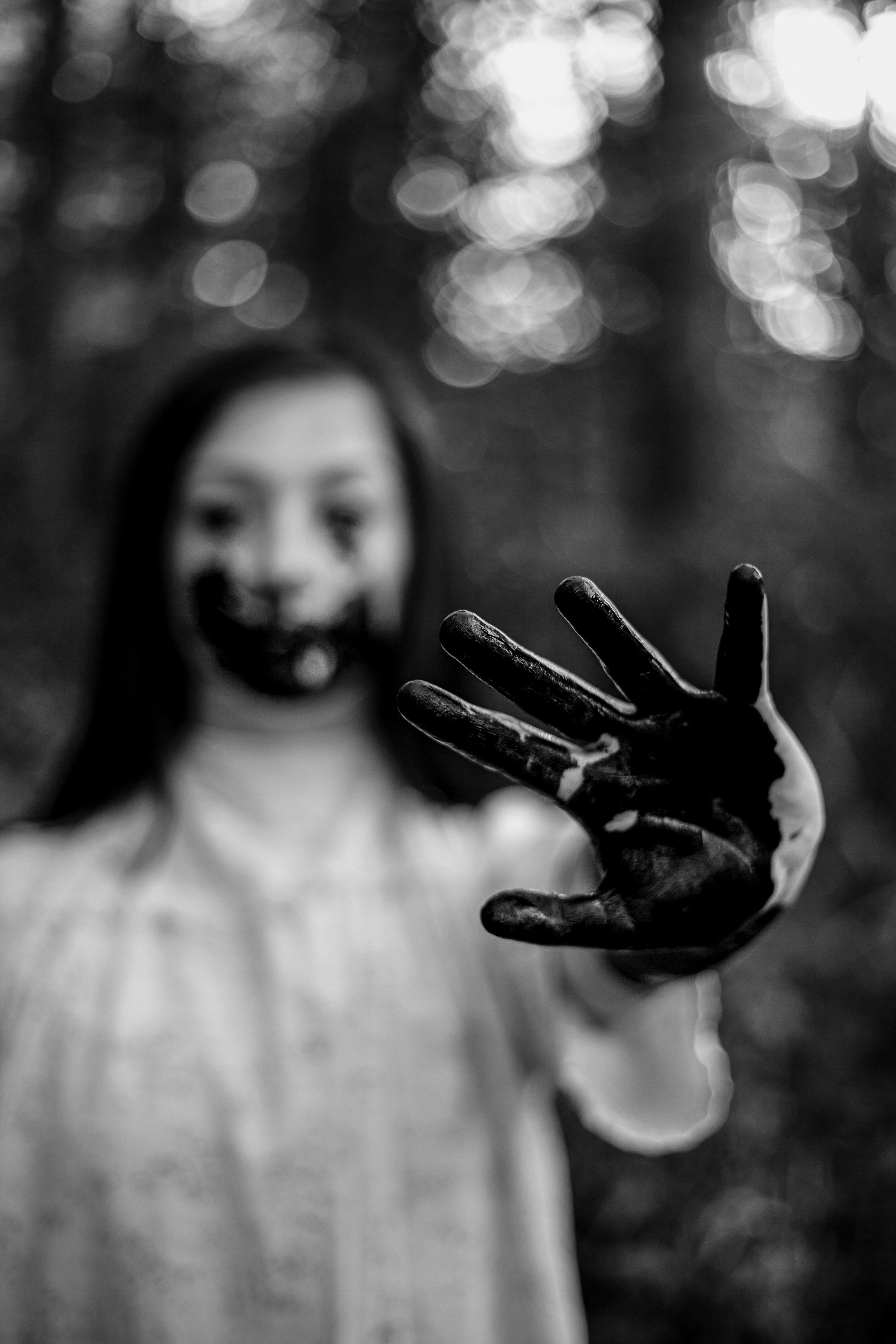 3744x5616 Monochrome Photo of Woman with her Hands Painted Black · Free