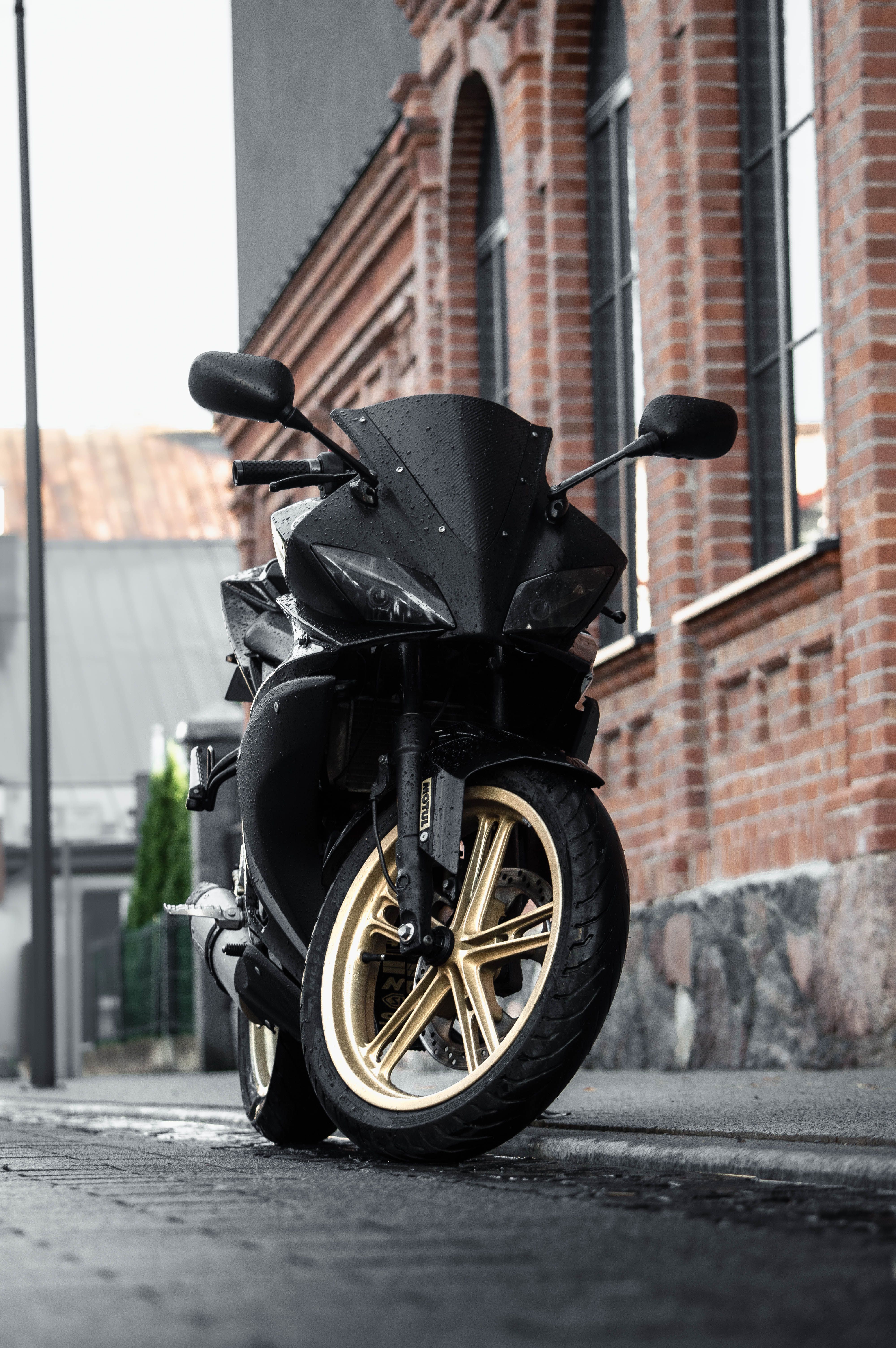 4000x6016 A Motorcycle Parked on a Sidewalk · Free