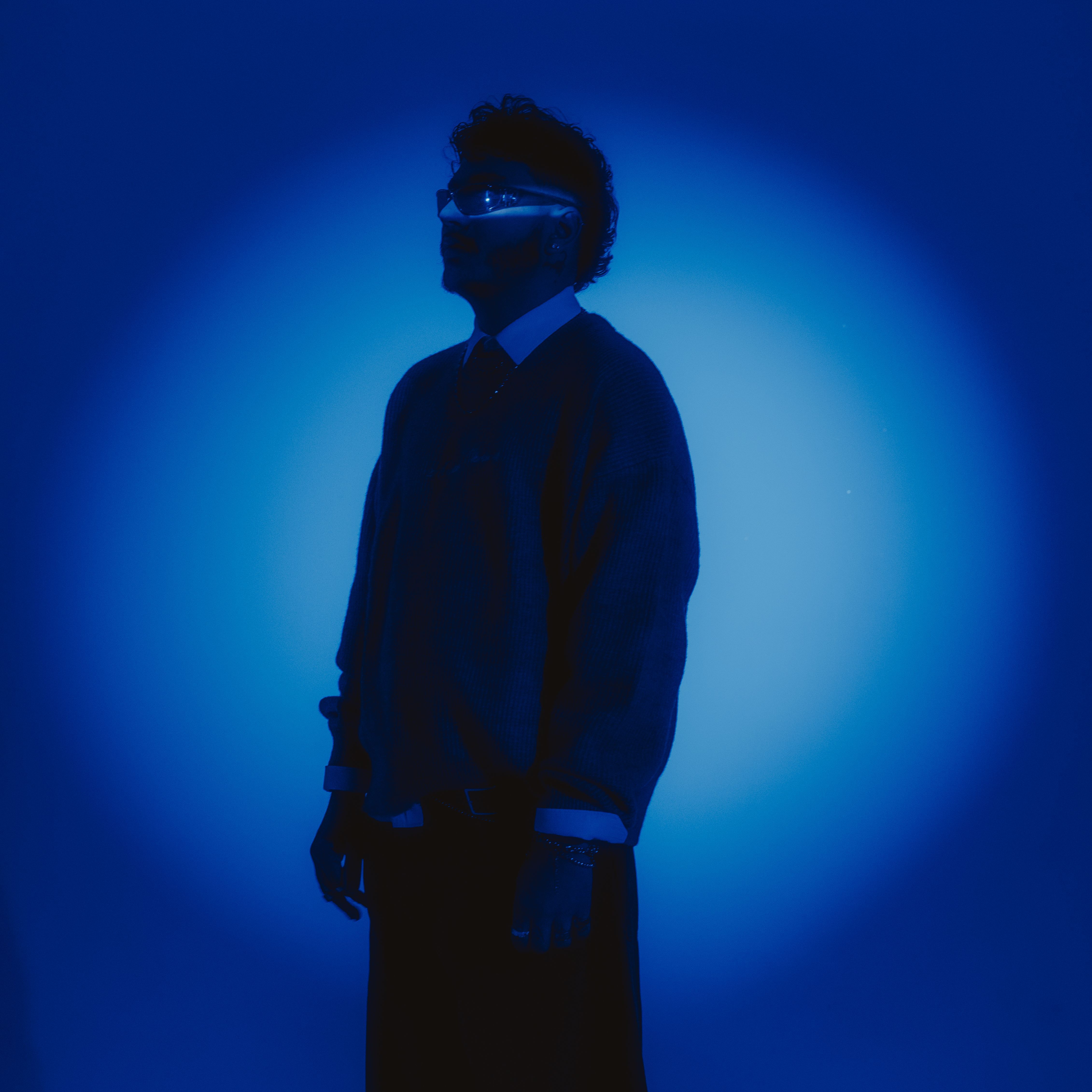 4523x4523 Silhouette of Person in Blue Studio Lighting · Free
