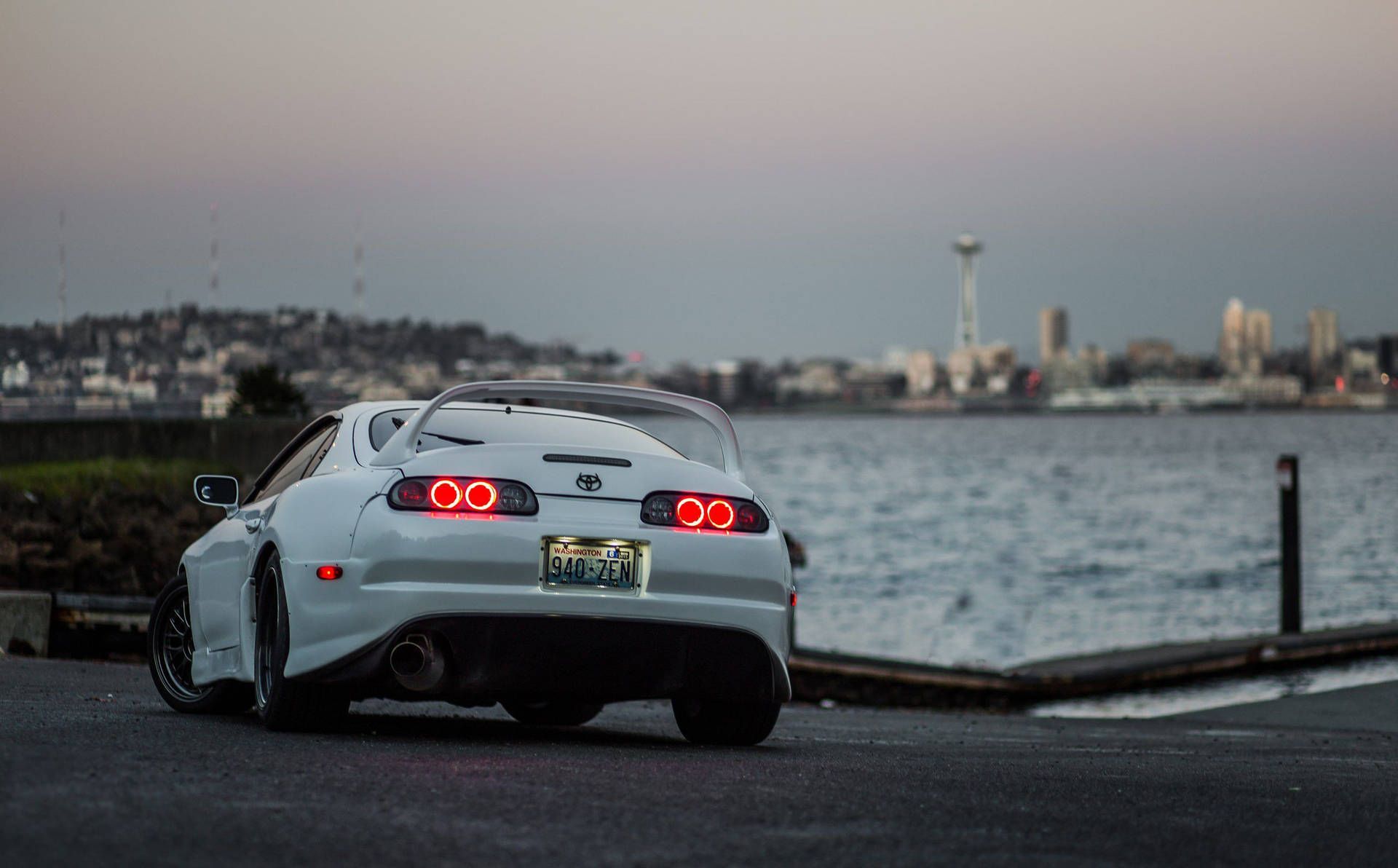 1920x1192 Download White Toyota Supra Car Near Bay Wallpaper