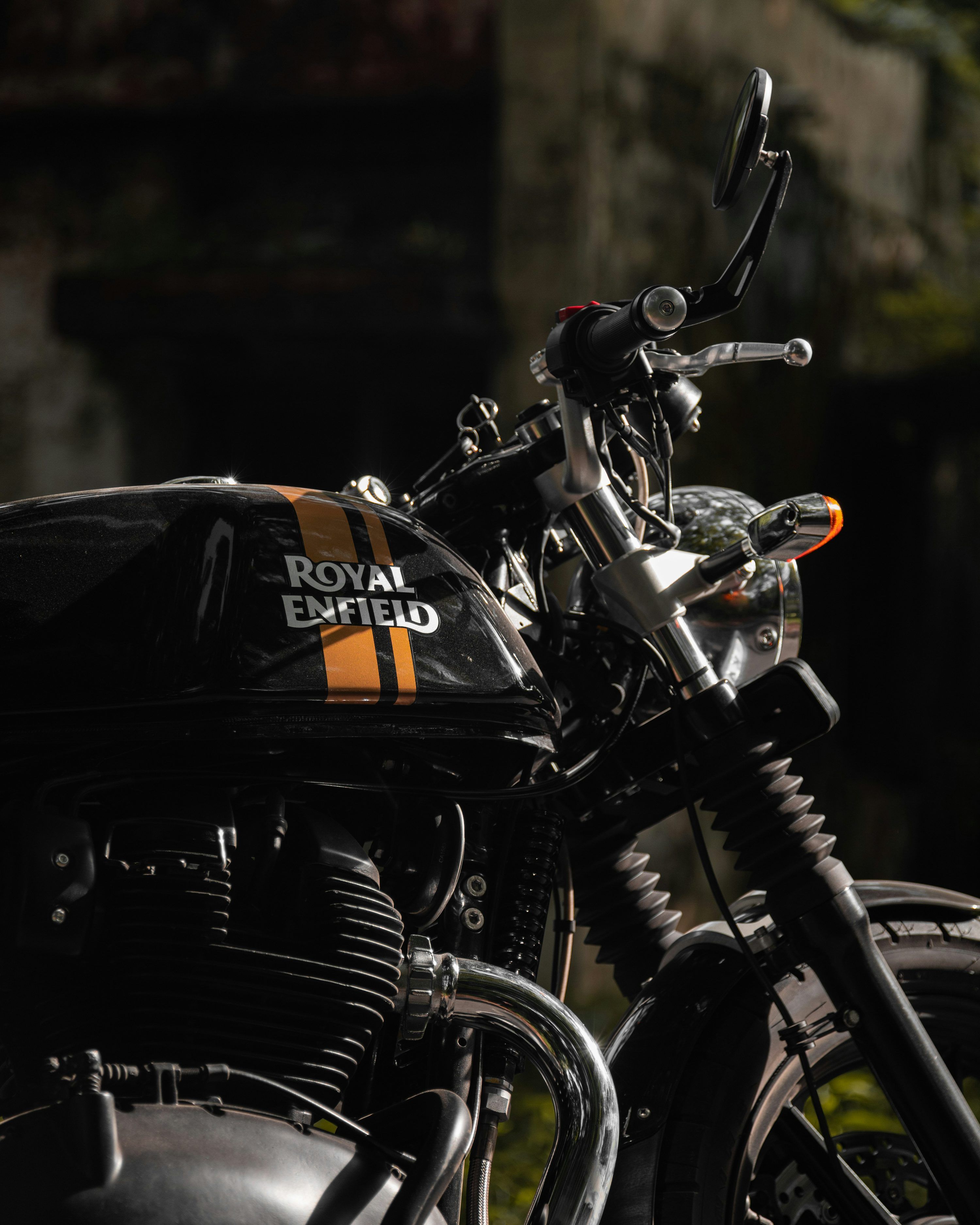 3000x3750 A royal enfield motorcycle parked in front of a building photo