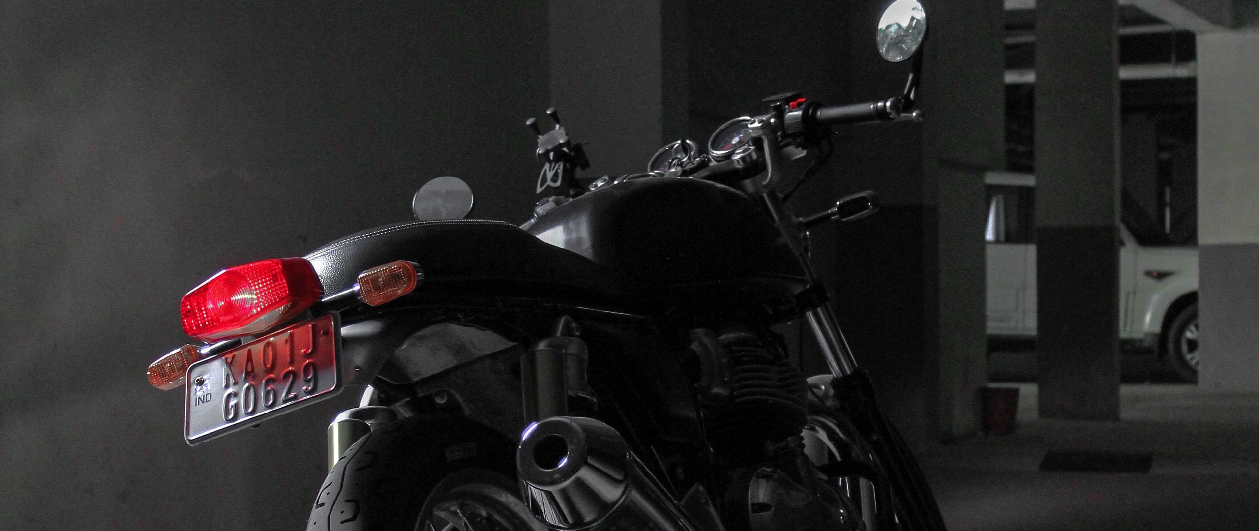 2560x1080 Download wallpaper 2560x1080 royal enfield continental gt royal enfield, motorcycle, bike, black, rear view dual wide 1080p HD background