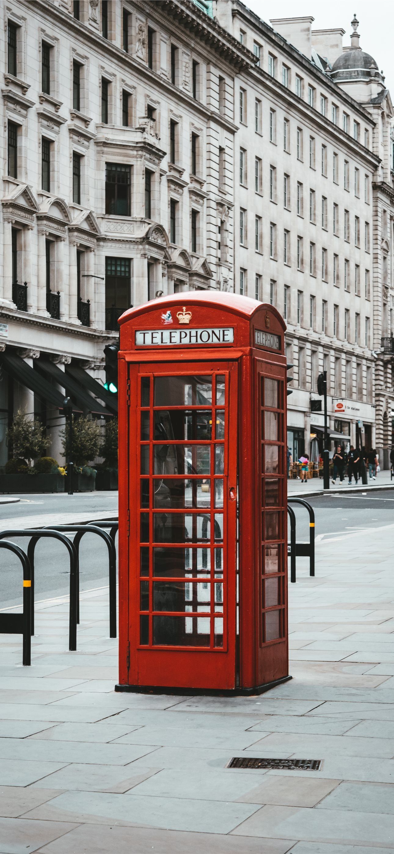 1290x2796 red telephone booth near white concrete building d. iPhone Wallpaper Free Download