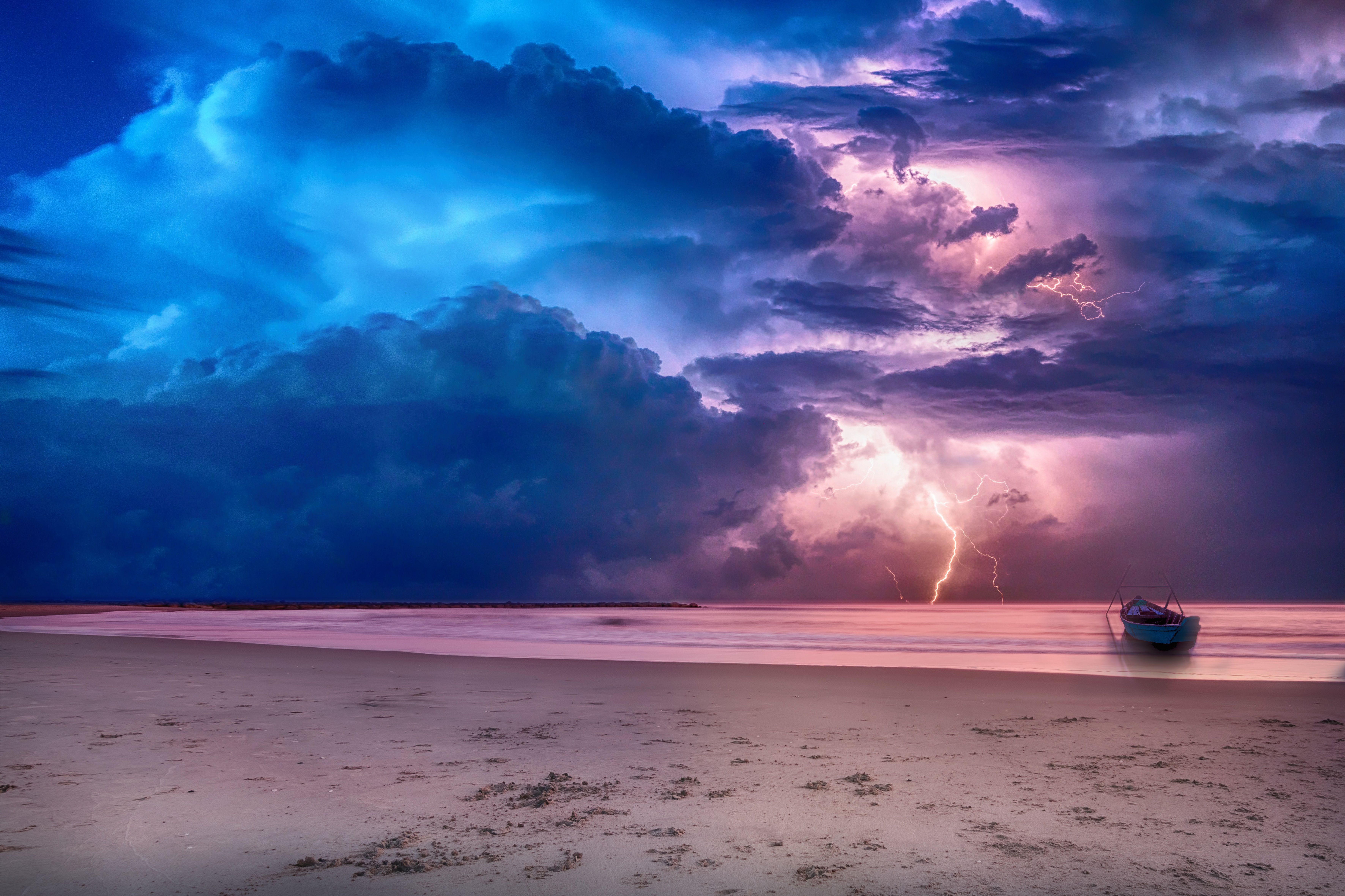 7087x4724 4K Ultra HD Lightning Storm Over Beach with Lone Boat