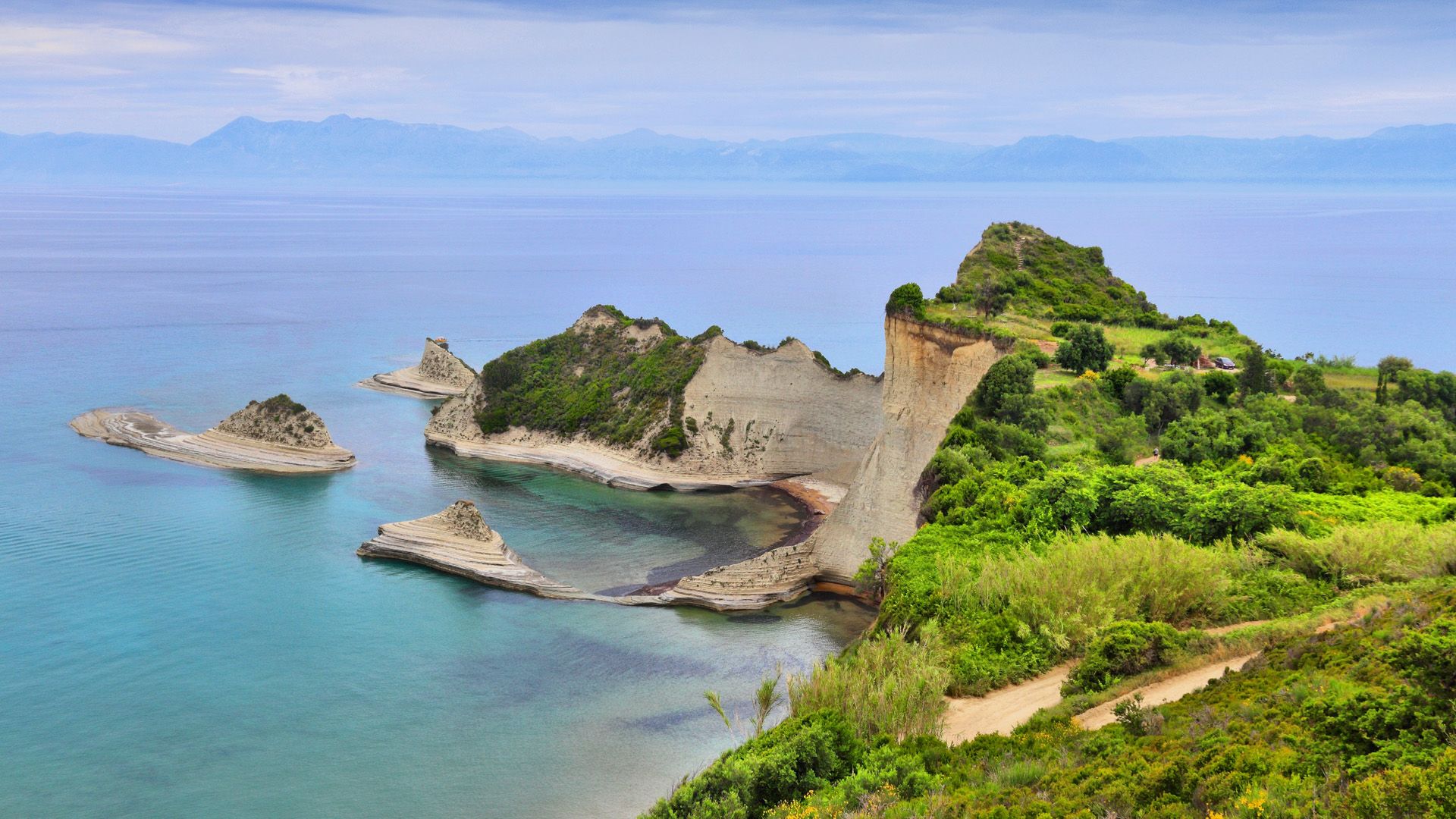 1920x1080 Corfu island landscape, Cape Drastis coast summer view, Ionian Sea, Greece. Windows Spotlight Image