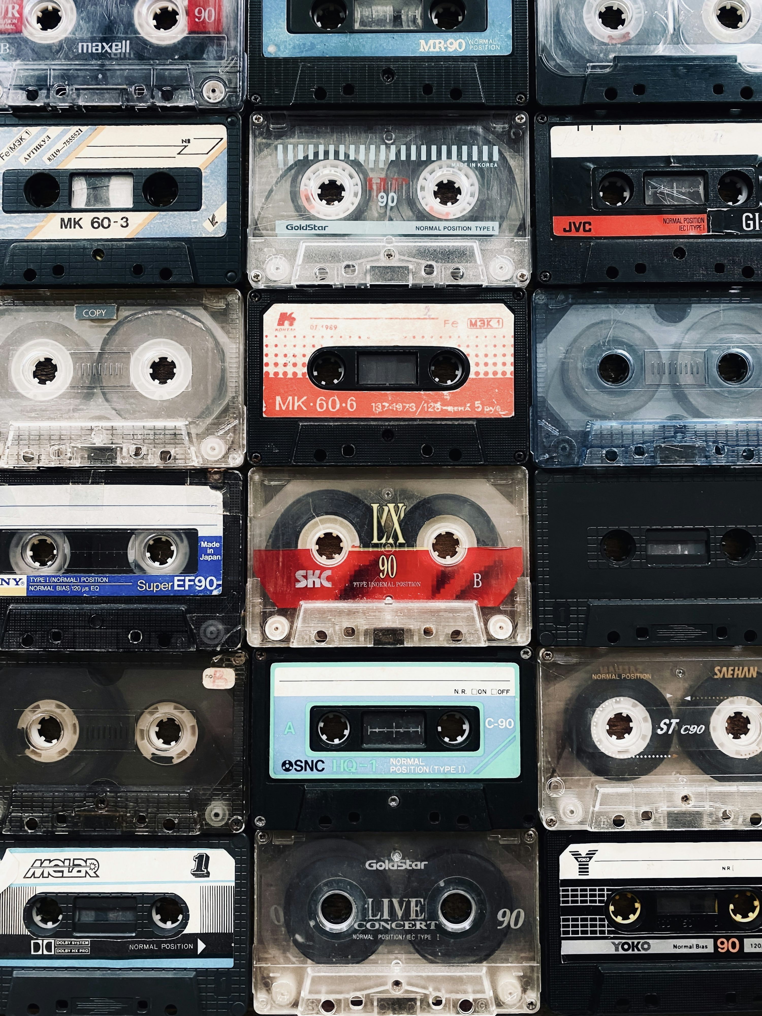 3000x4000 A bunch of cassettes stacked on top of each other photo