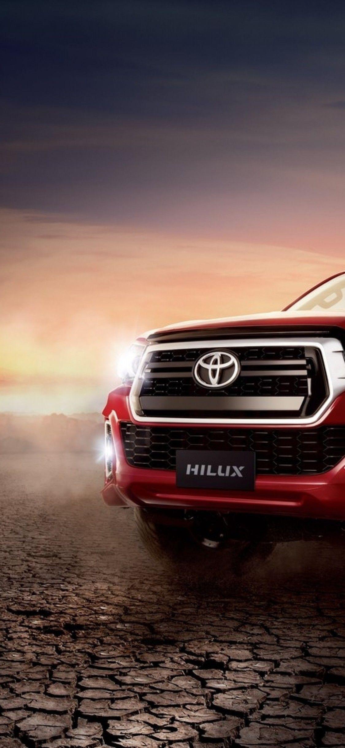 1125x2436 Download 1125x2436 Toyota Hilux Pickup Cars, Red Wallpaper