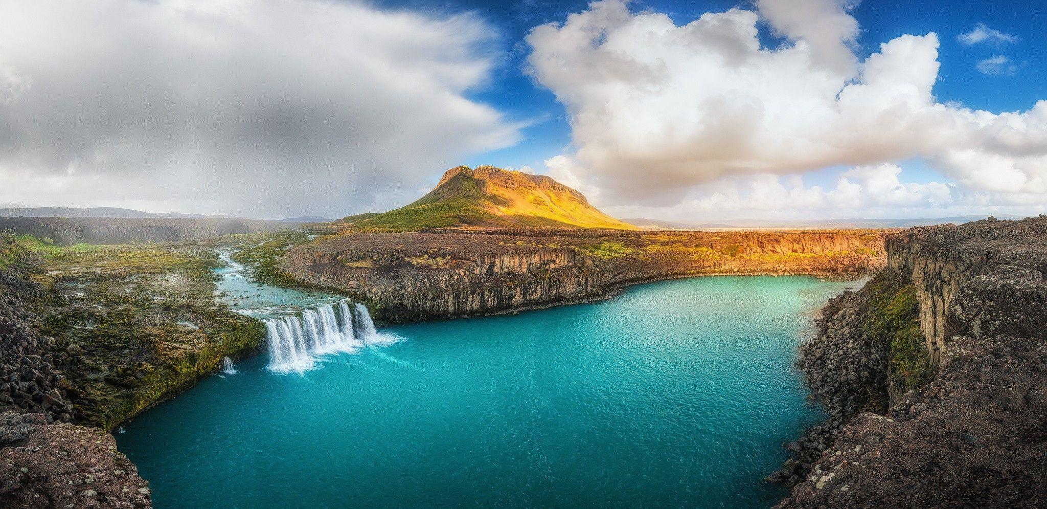2048x995 Waterfall and Mountain Lake in Iceland Wallpaper and Background