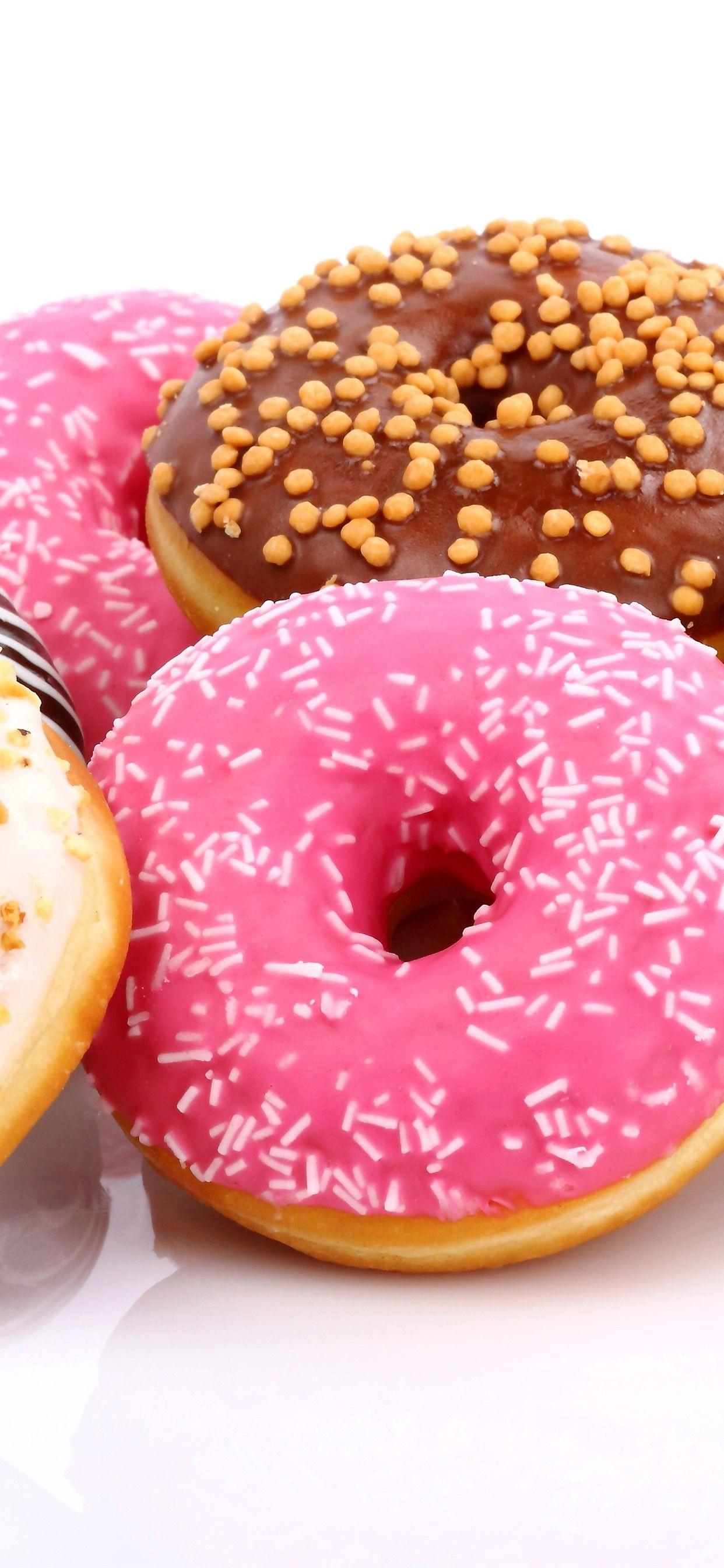 1242x2688 iPhone Wallpaper Some Donuts, White Background De Visite