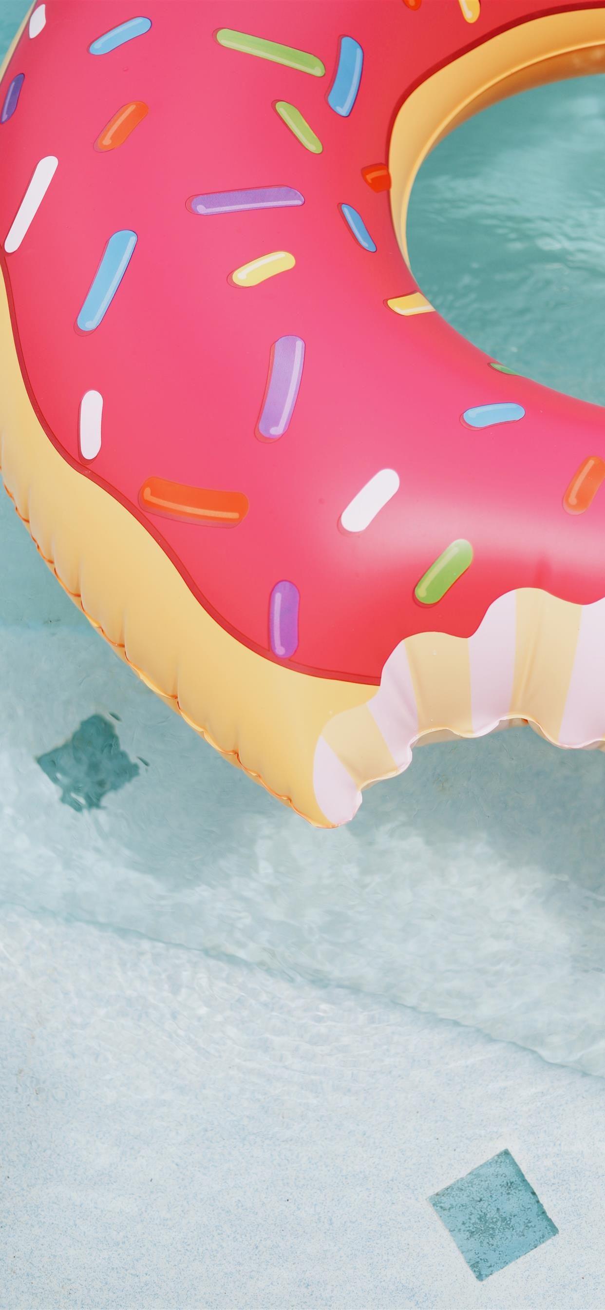 1242x2688 donut floatie in pool iPhone Wallpaper Free Download