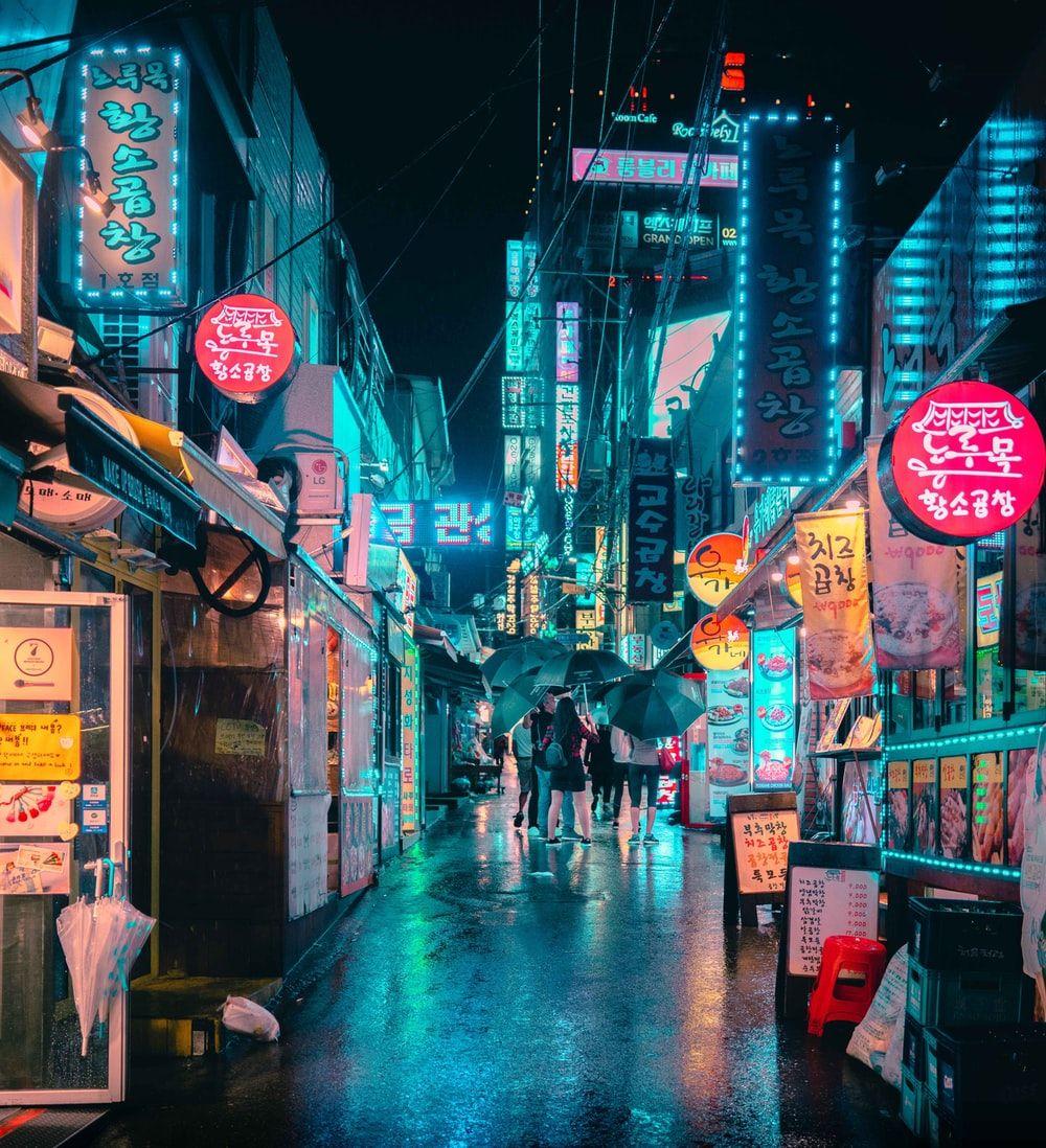 1000x1098 person carrying bag walking in front of store photo