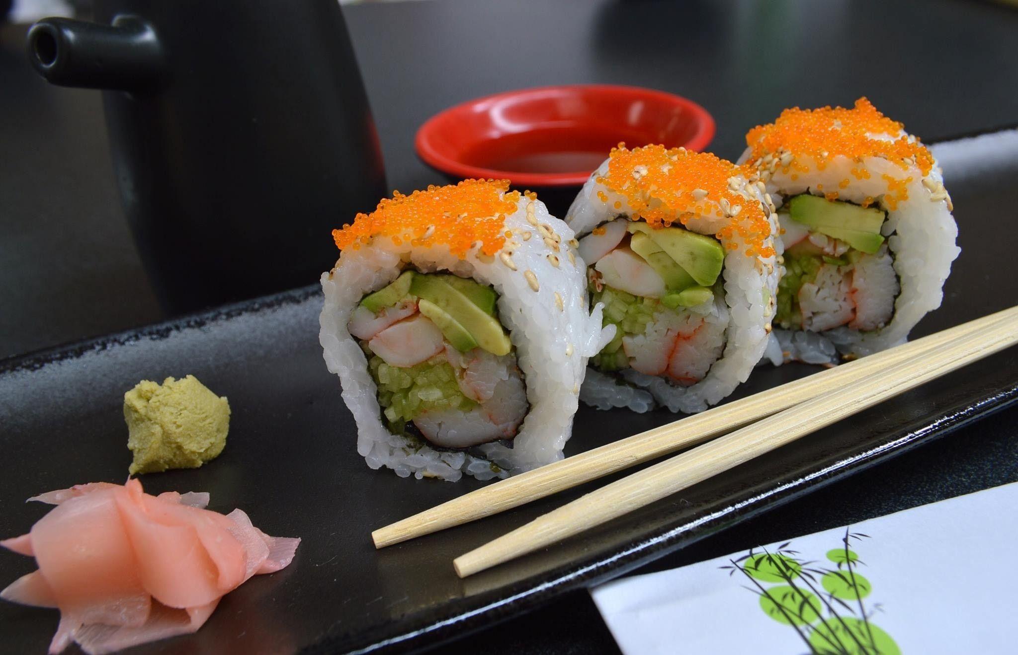 2048x1319 Sushi beside chopsticks and salmon meat free image