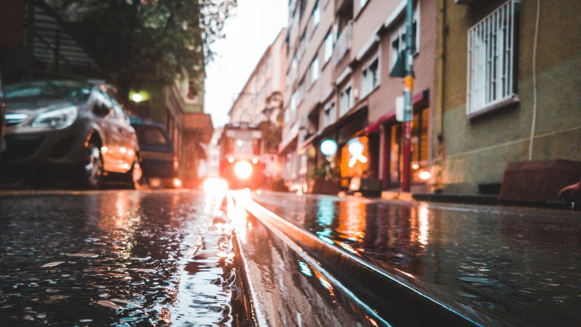 1920x1080 Tram Rail Closeup Photo in Rainy Season Wallpaper