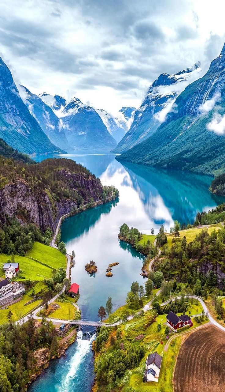736x1280 Discover the Beauty of the Norwegian Fjords and Northern Lights. Beautiful norway landscape, Norway beauty, Norway countryside wallpaper 4k